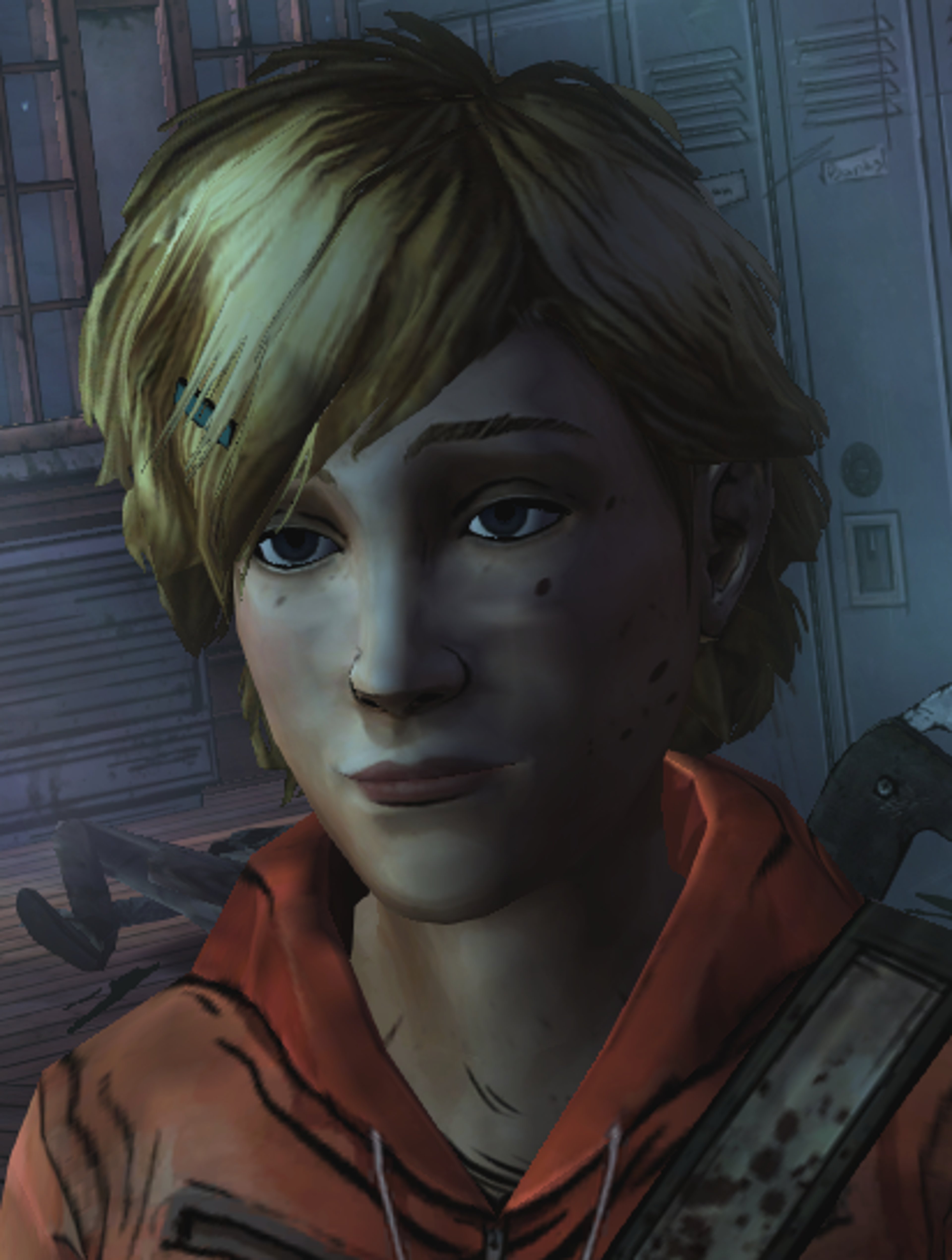 A young woman with short, blonde and dark hair wearing an orange shirt