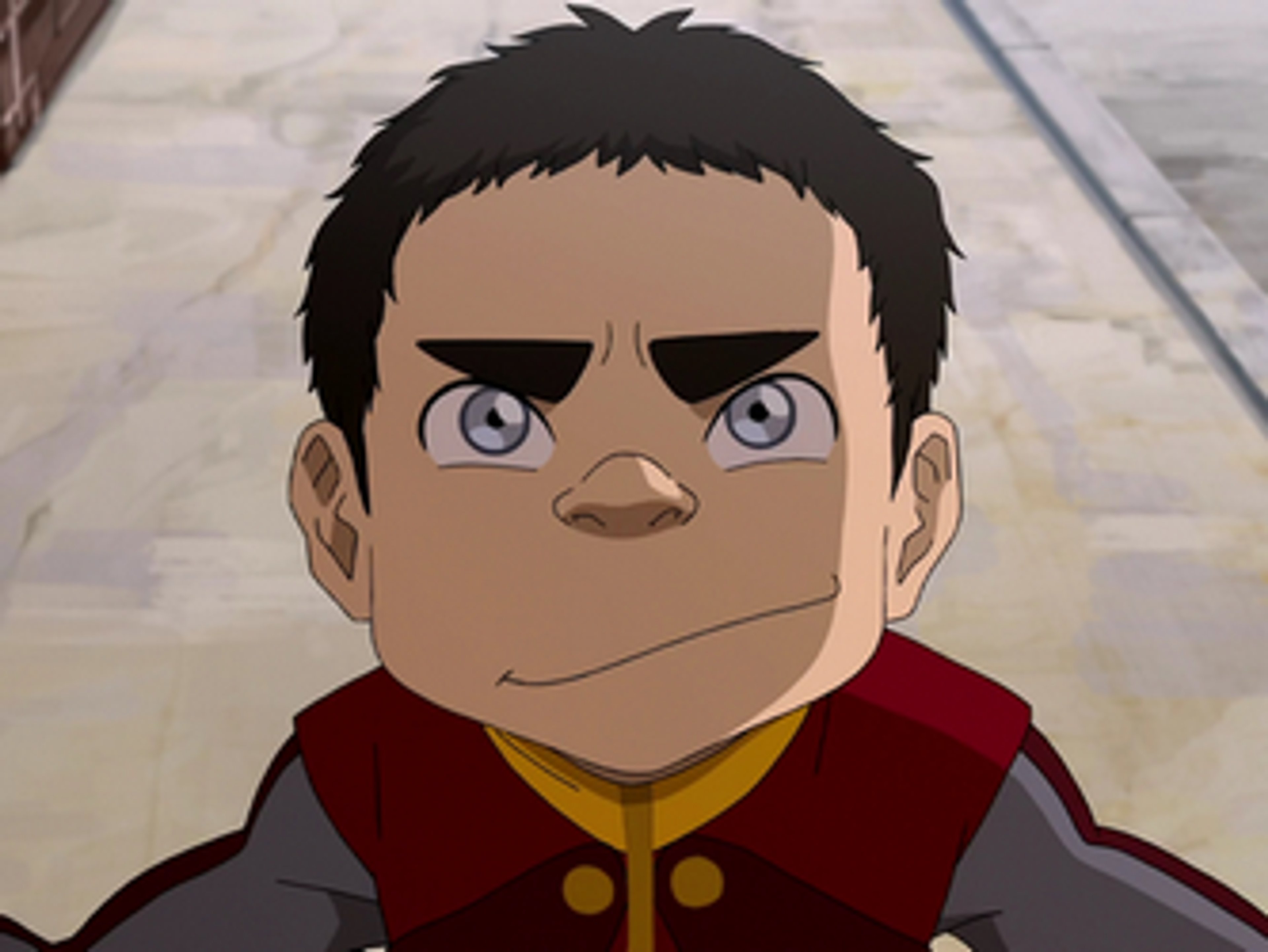 A young airbender boy with spiky black hair and a determined expression