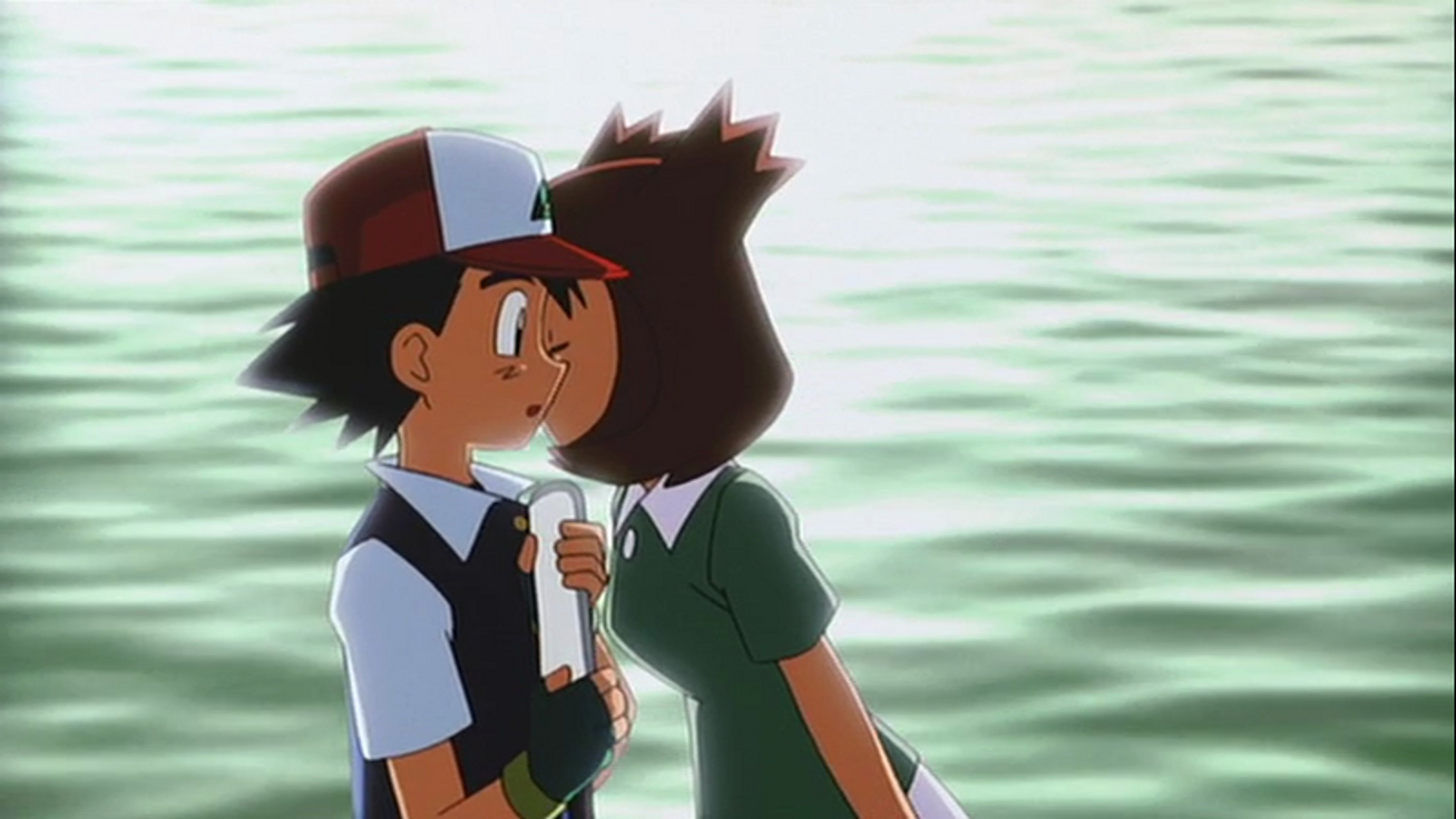 A young woman with reddish-brown hair, an artist with a connection to Legendary Pokémon.