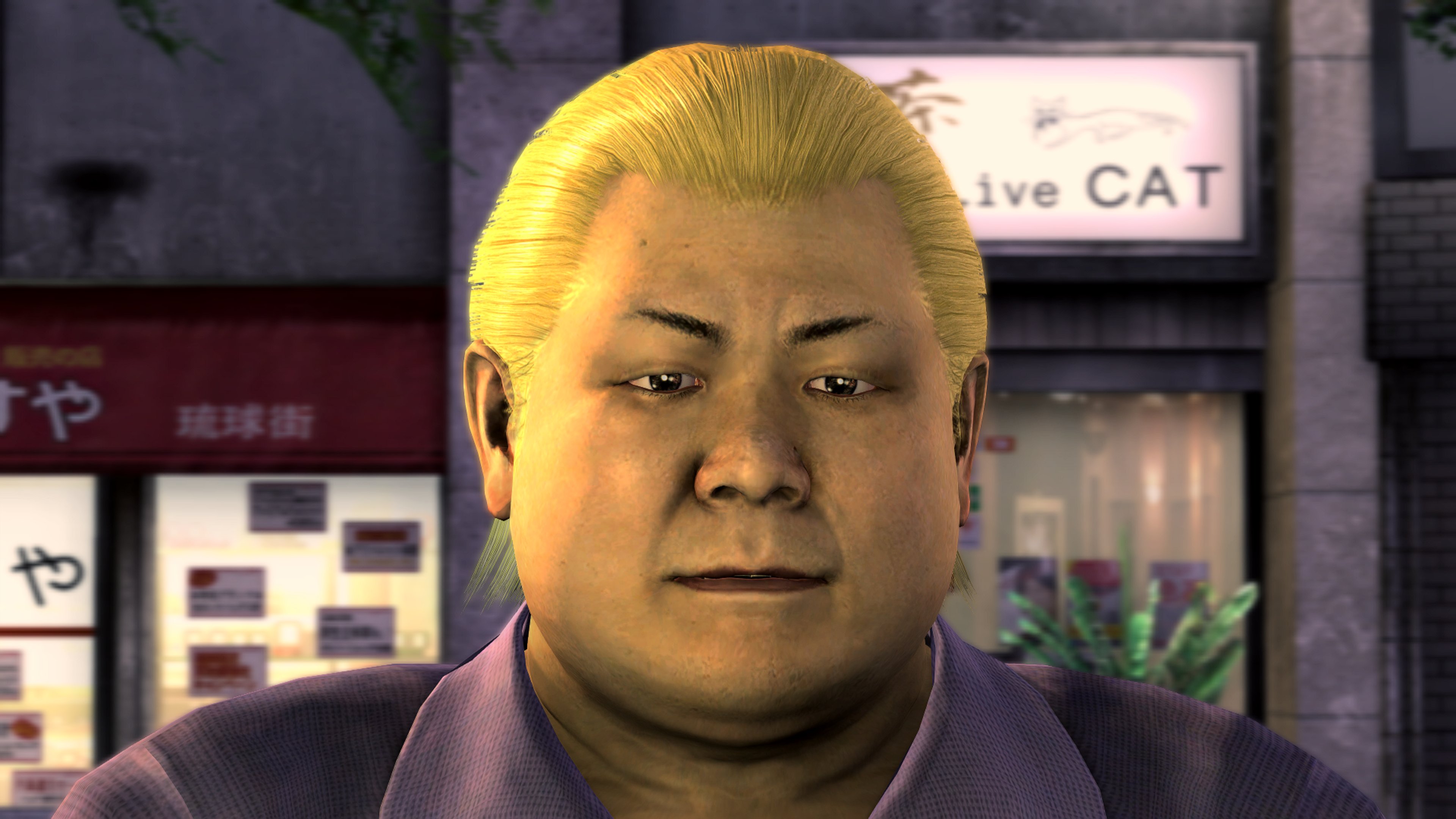 A middle-aged man with an obese build, dyed blonde hair, and a purple shirt with an anchor logo