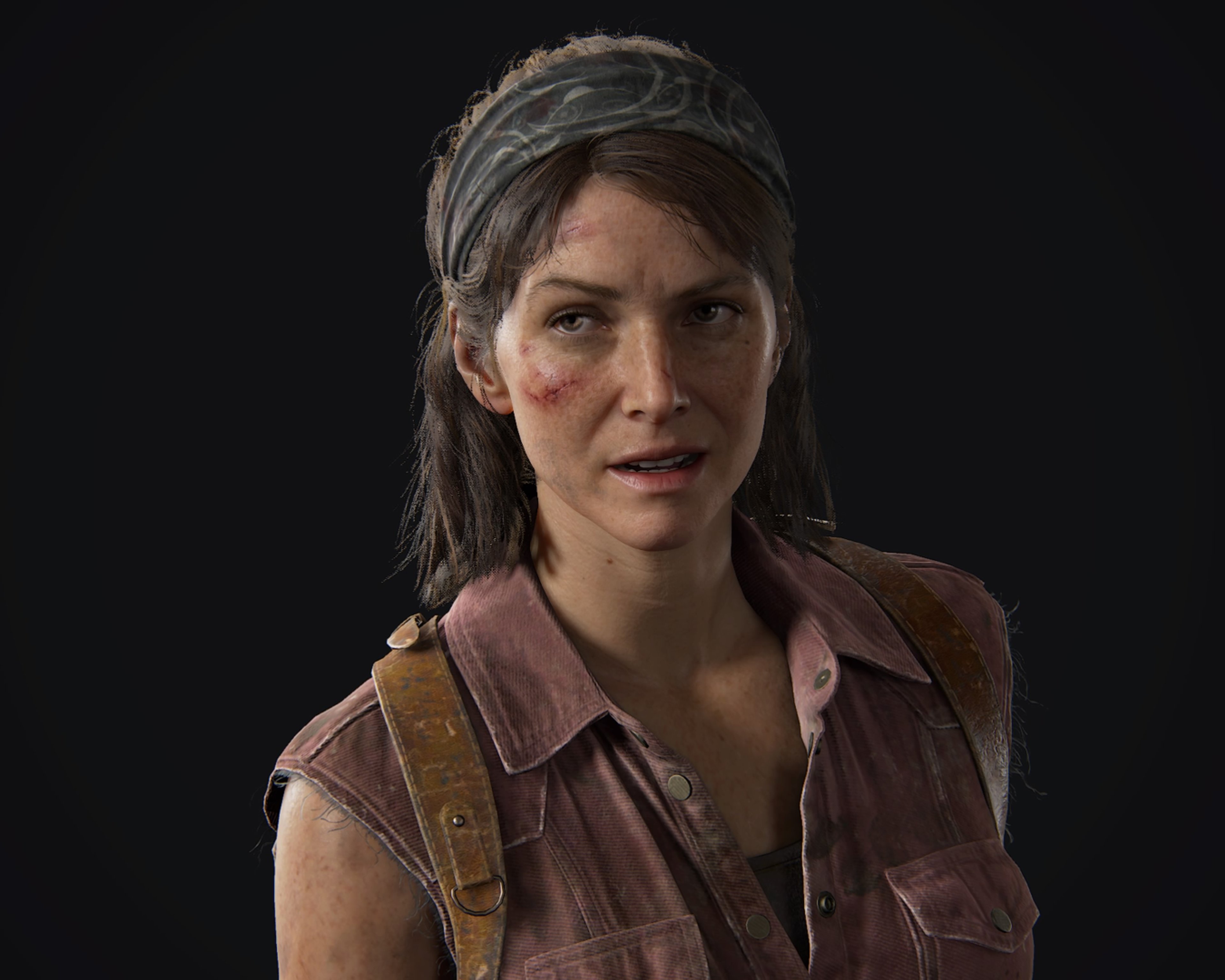 A middle-aged woman with a serious expression in a post-apocalyptic setting