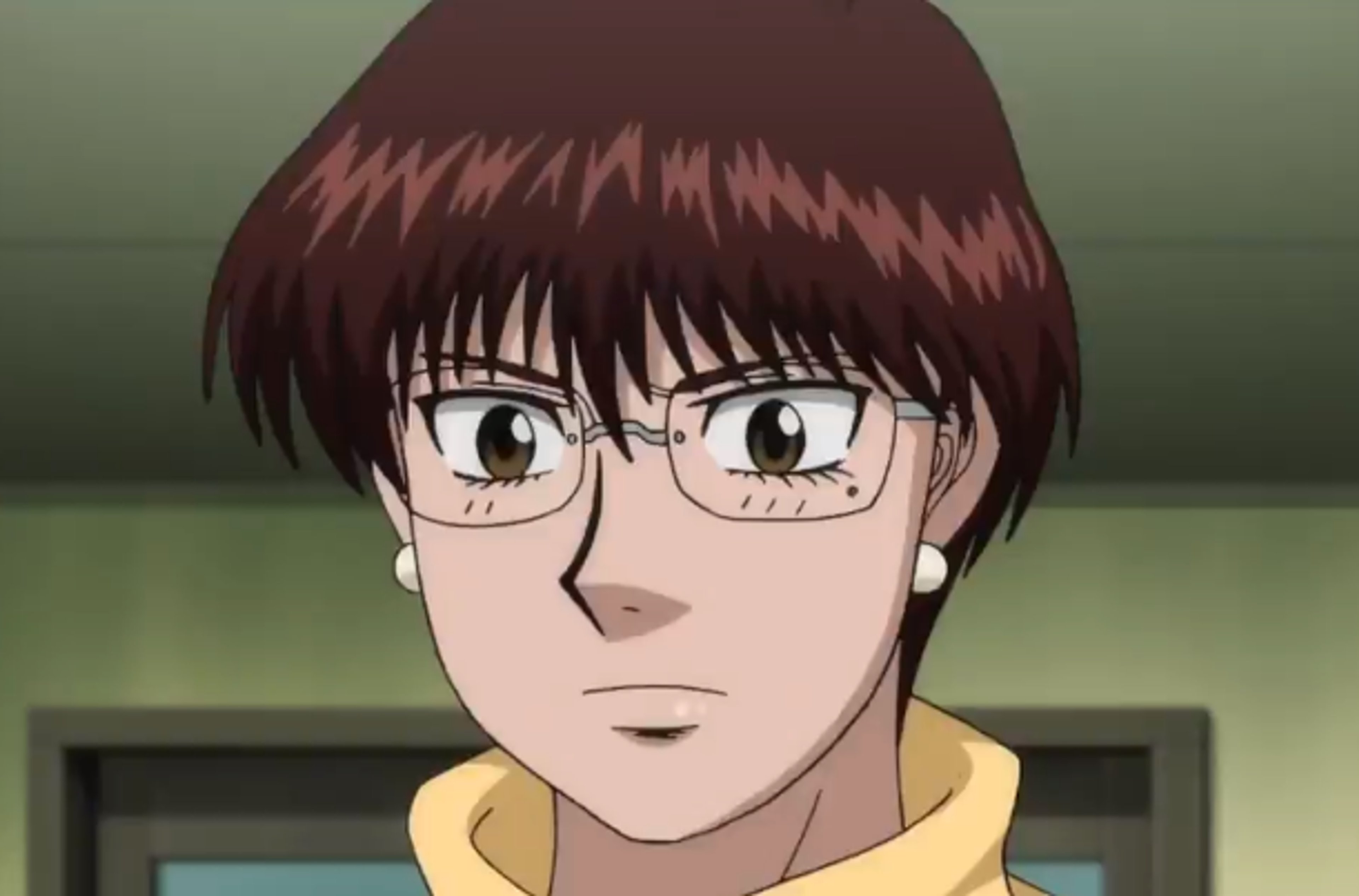 An anime-style character wearing a lab coat, with a serious expression