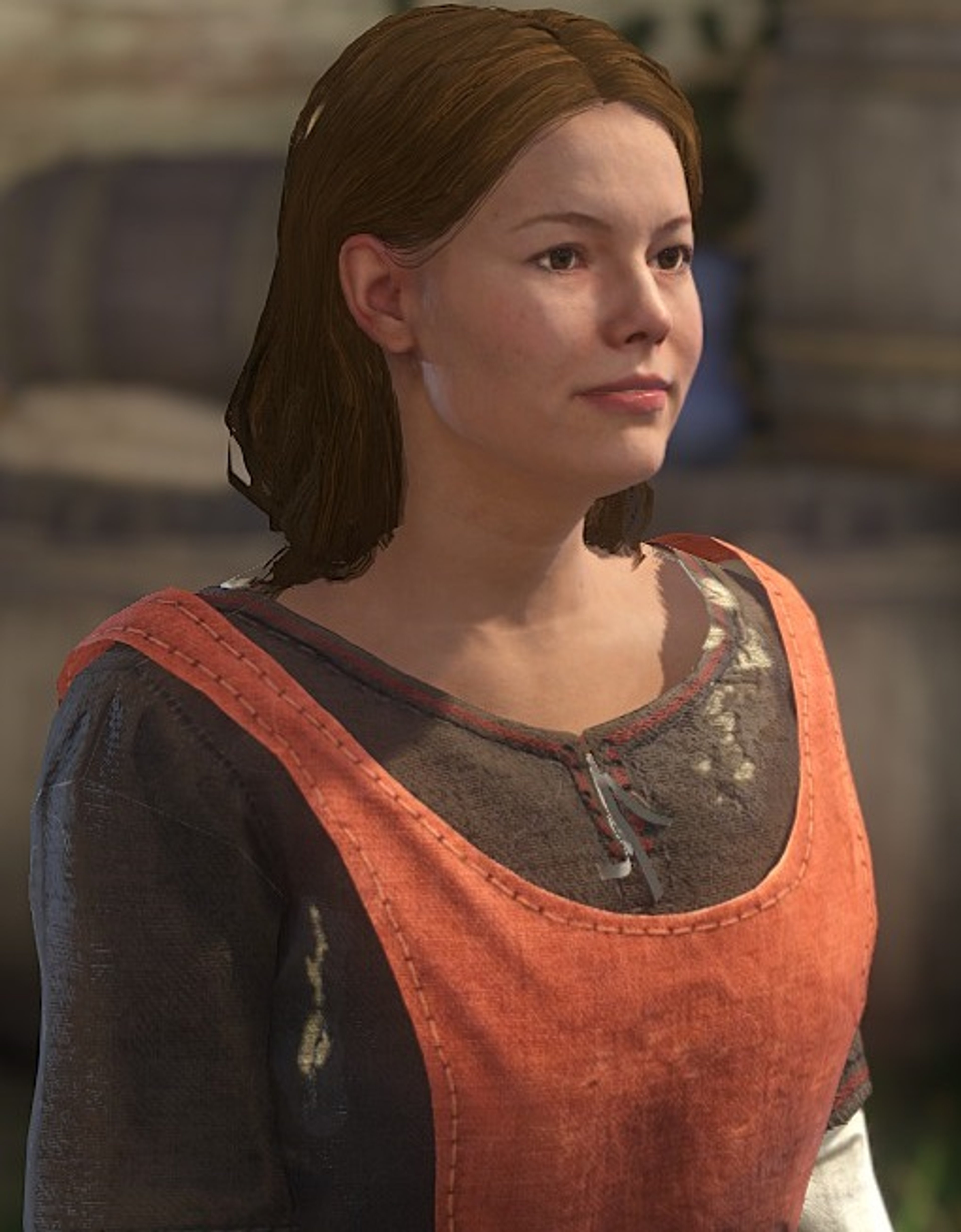 A young woman with brown hair and eyes, wearing a red and brown dress, standing in a tavern setting.