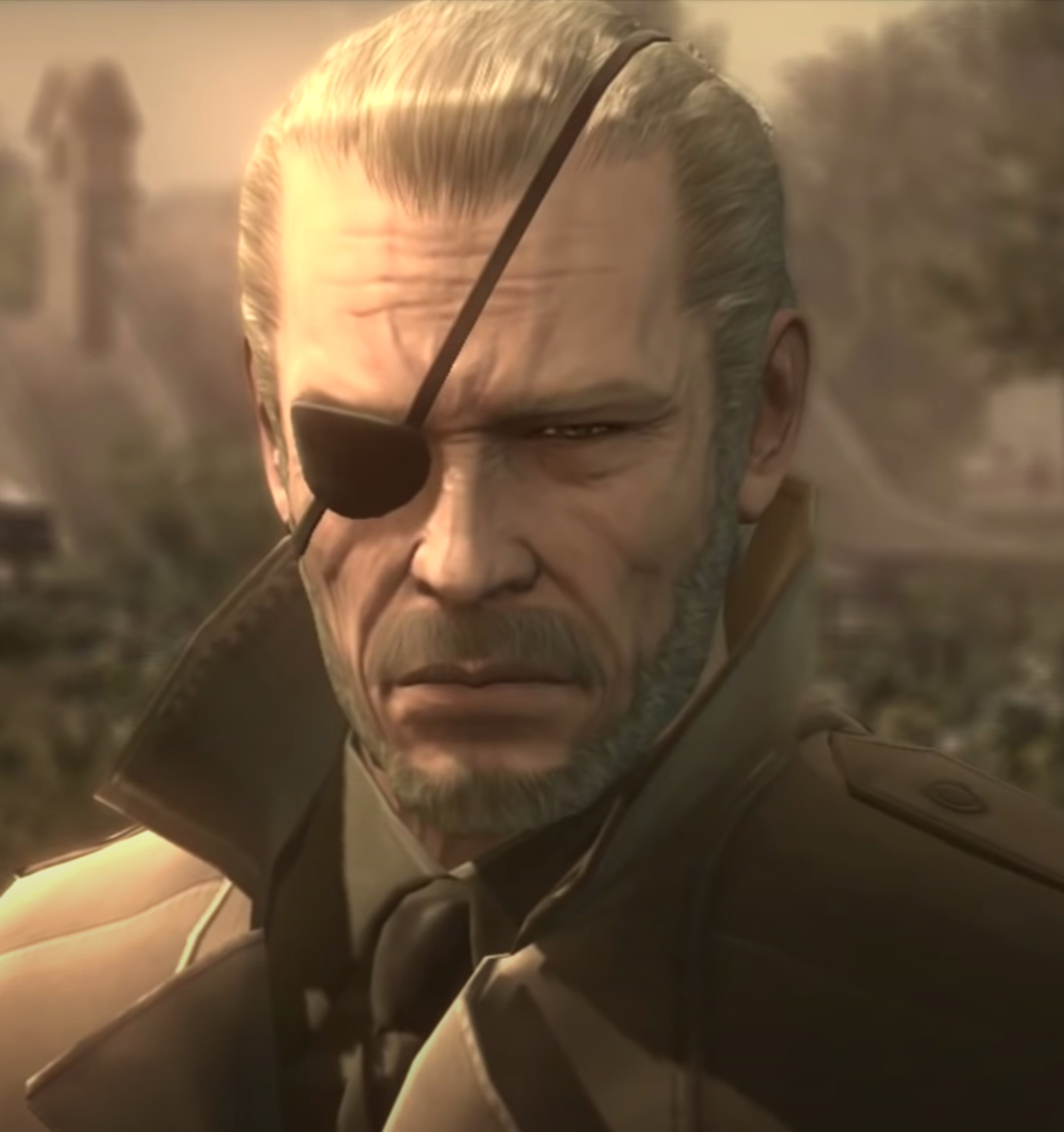 A man with an eyepatch wearing a military jacket