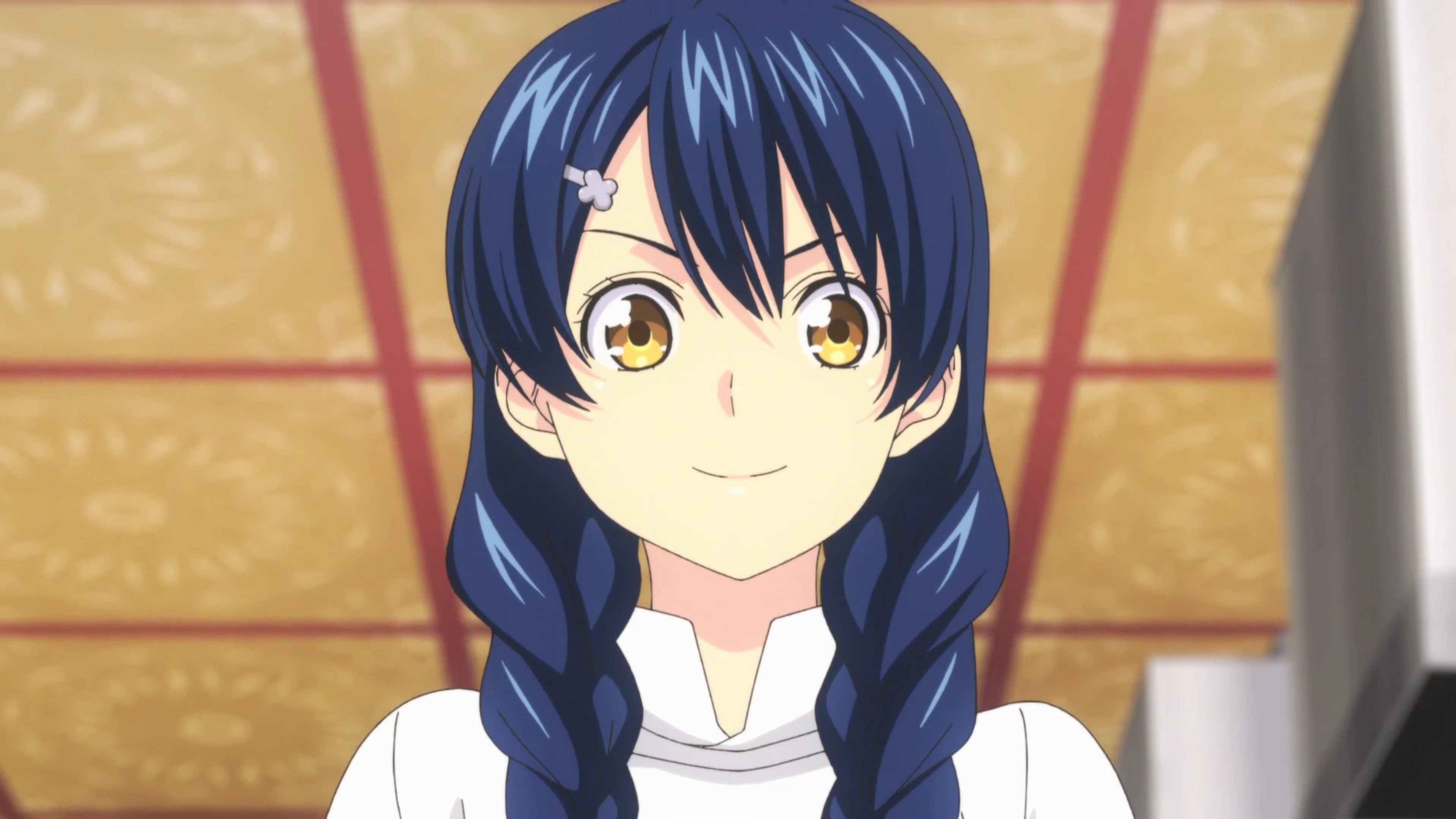 An anime-style character with blue braided hair and a friendly expression