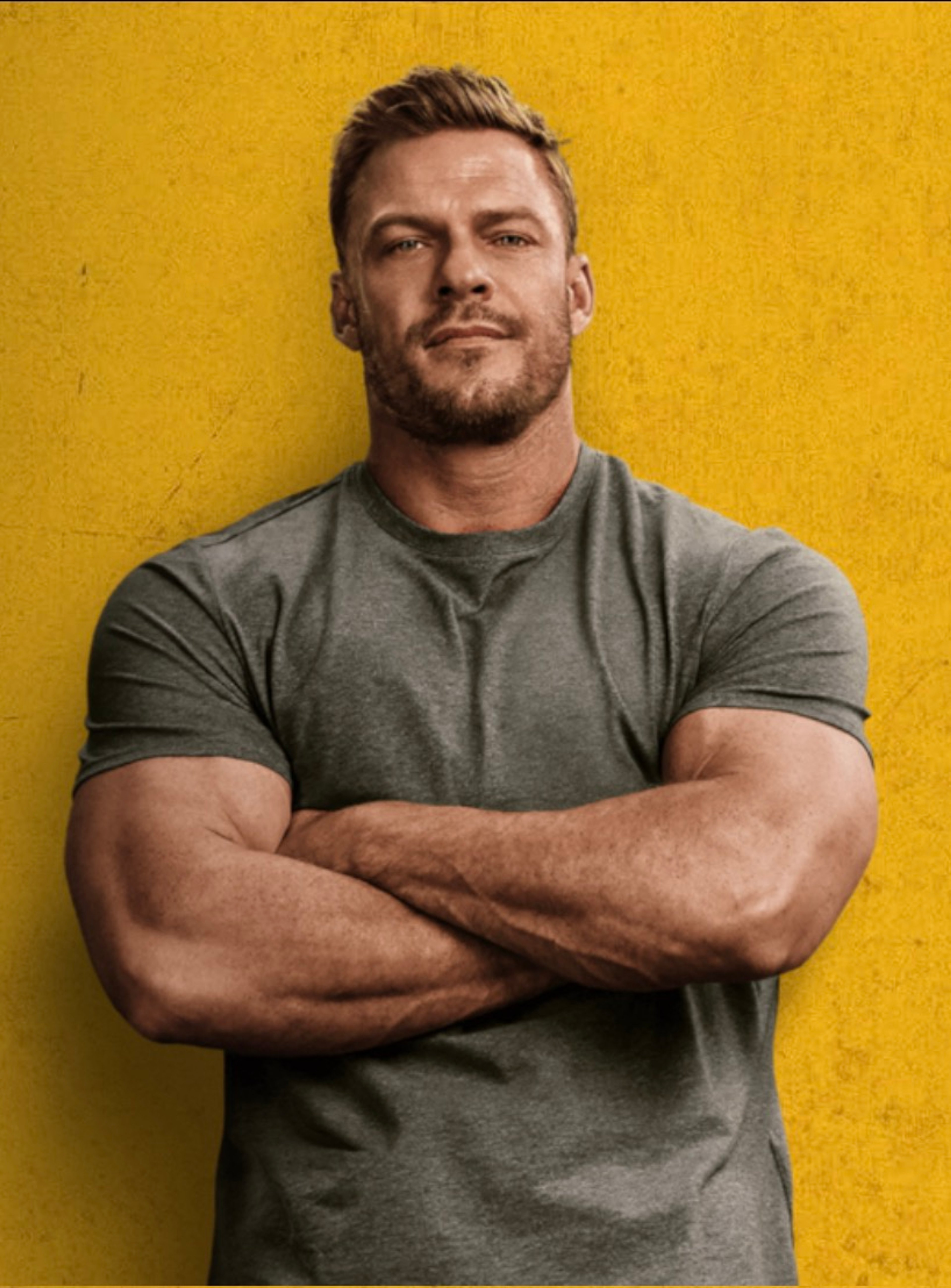A muscular, imposing man with a rugged, chiseled appearance