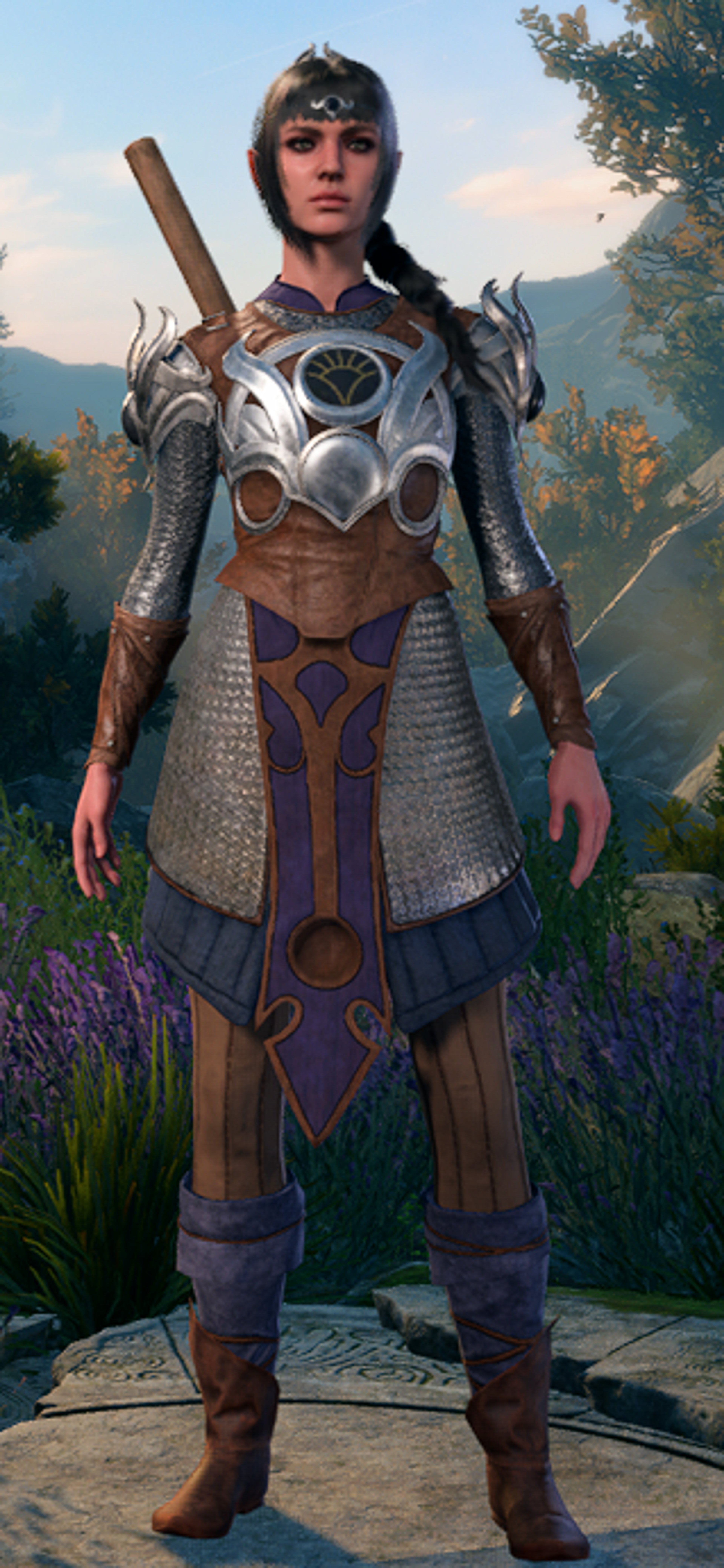 A half-elf female character in detailed fantasy armor, holding a weapon and standing in a natural environment.