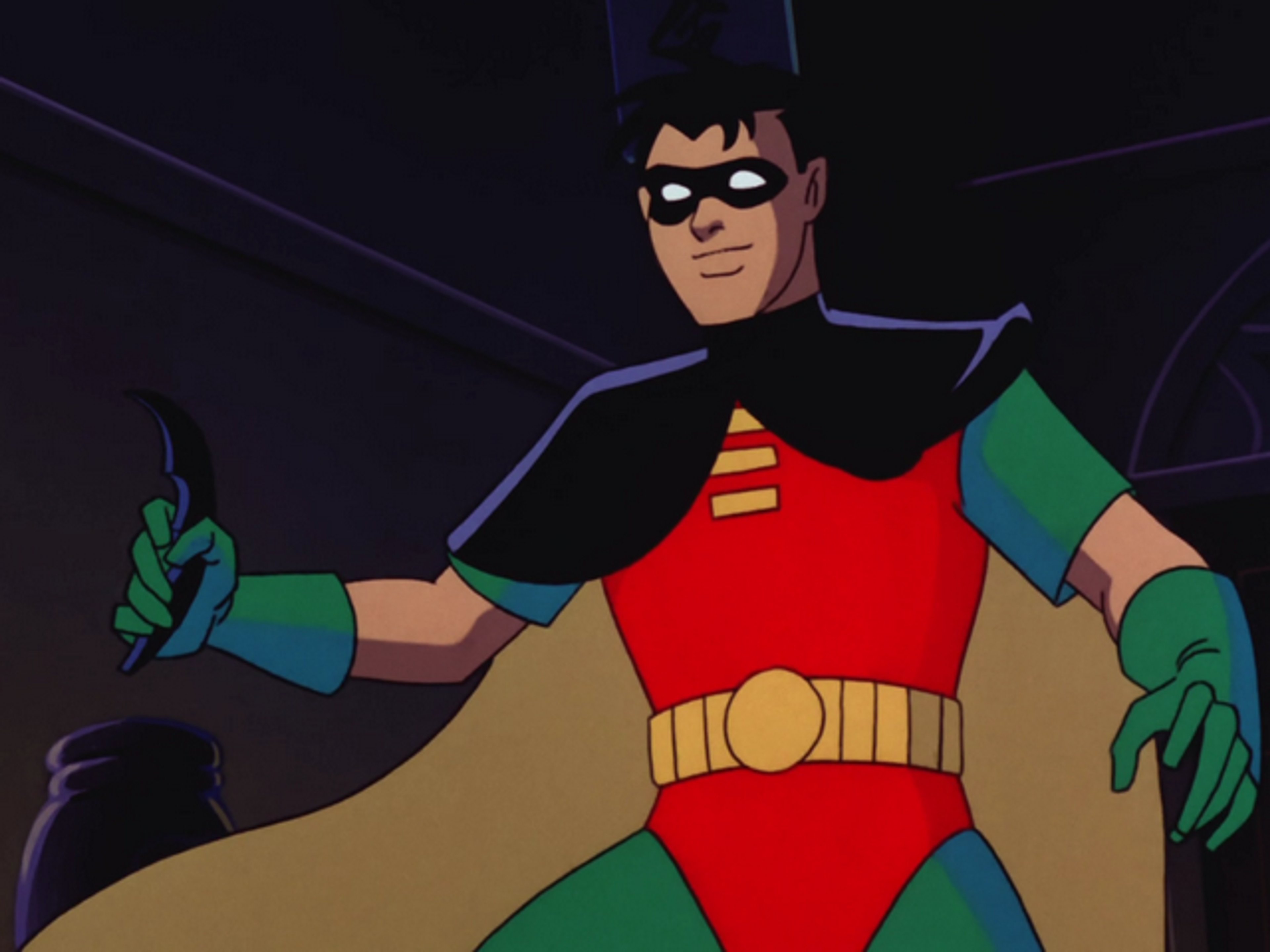 A male superhero character in a red and green costume, ready for action.