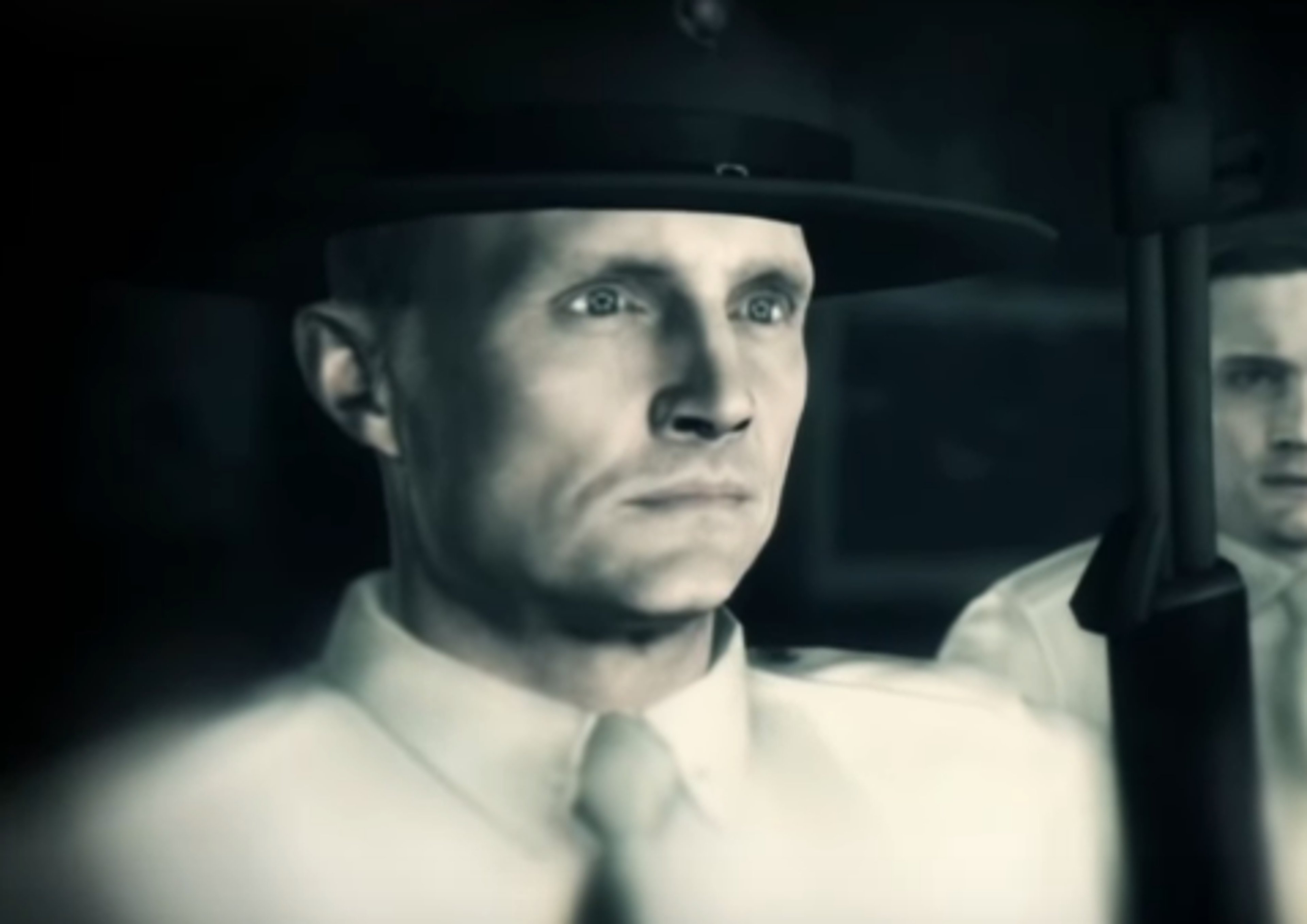 A stern-looking Marine drill instructor in uniform