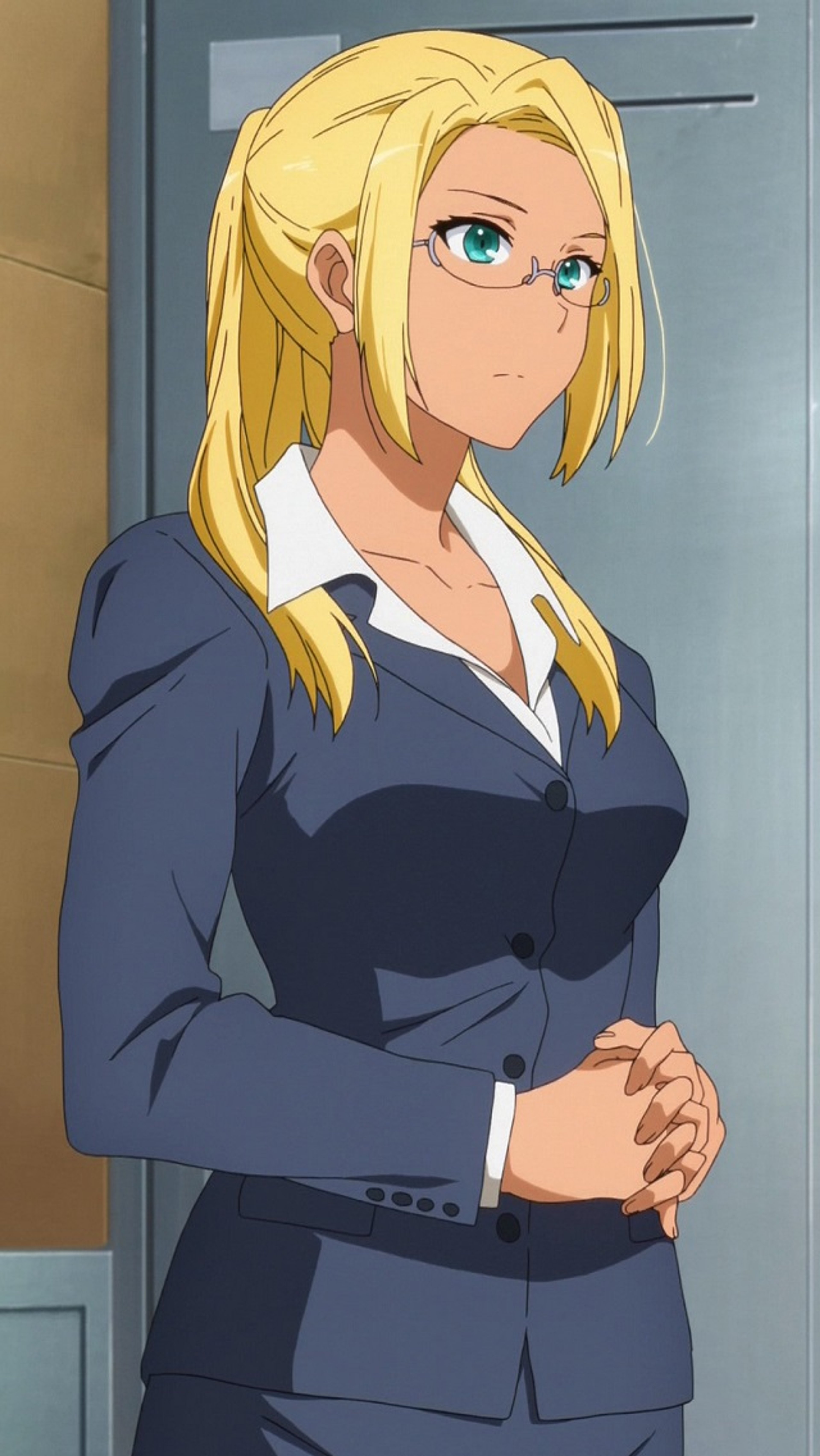 A professional-looking woman with blonde hair in a suit