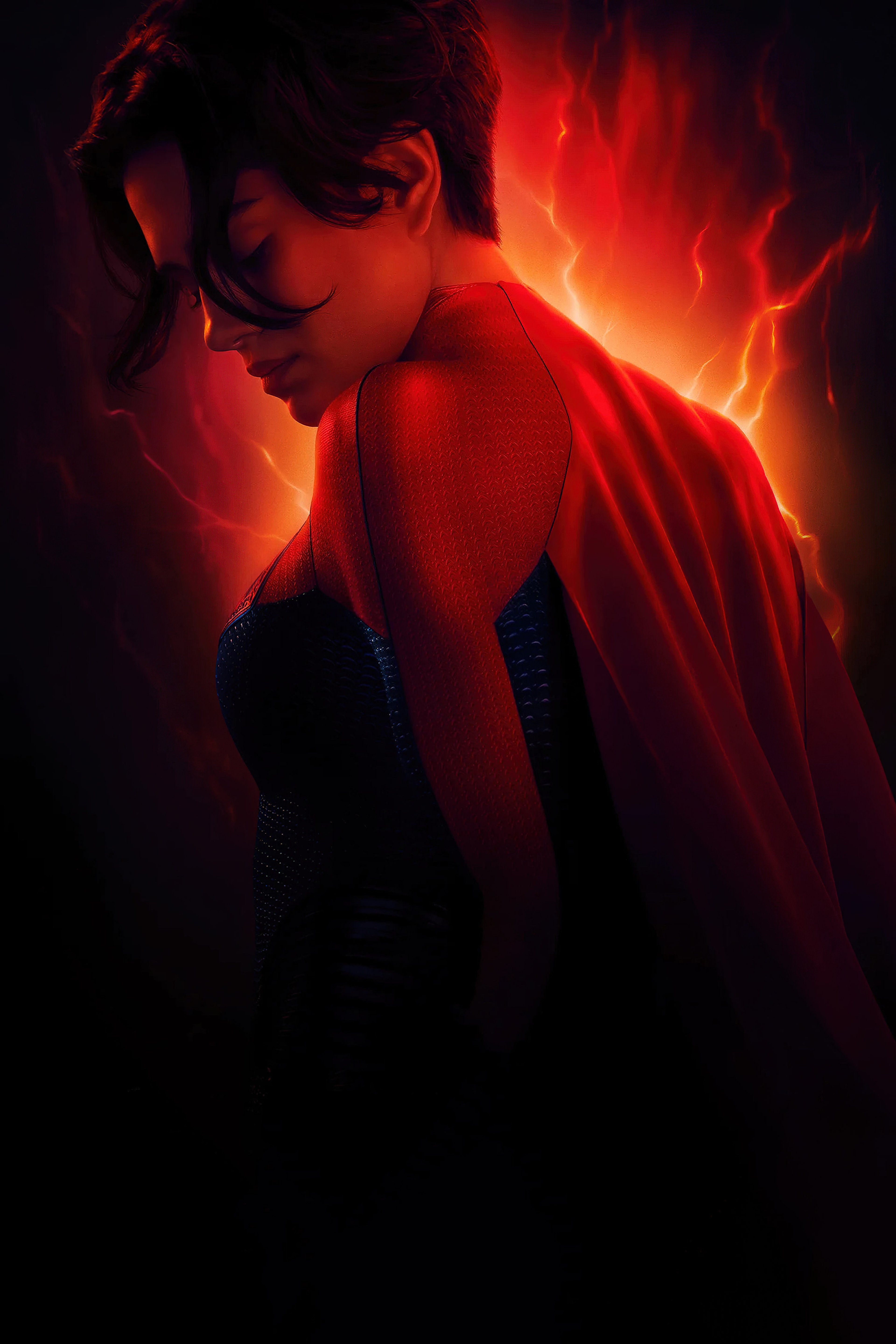 A woman in a red cape and bodysuit standing in a dark, fiery environment