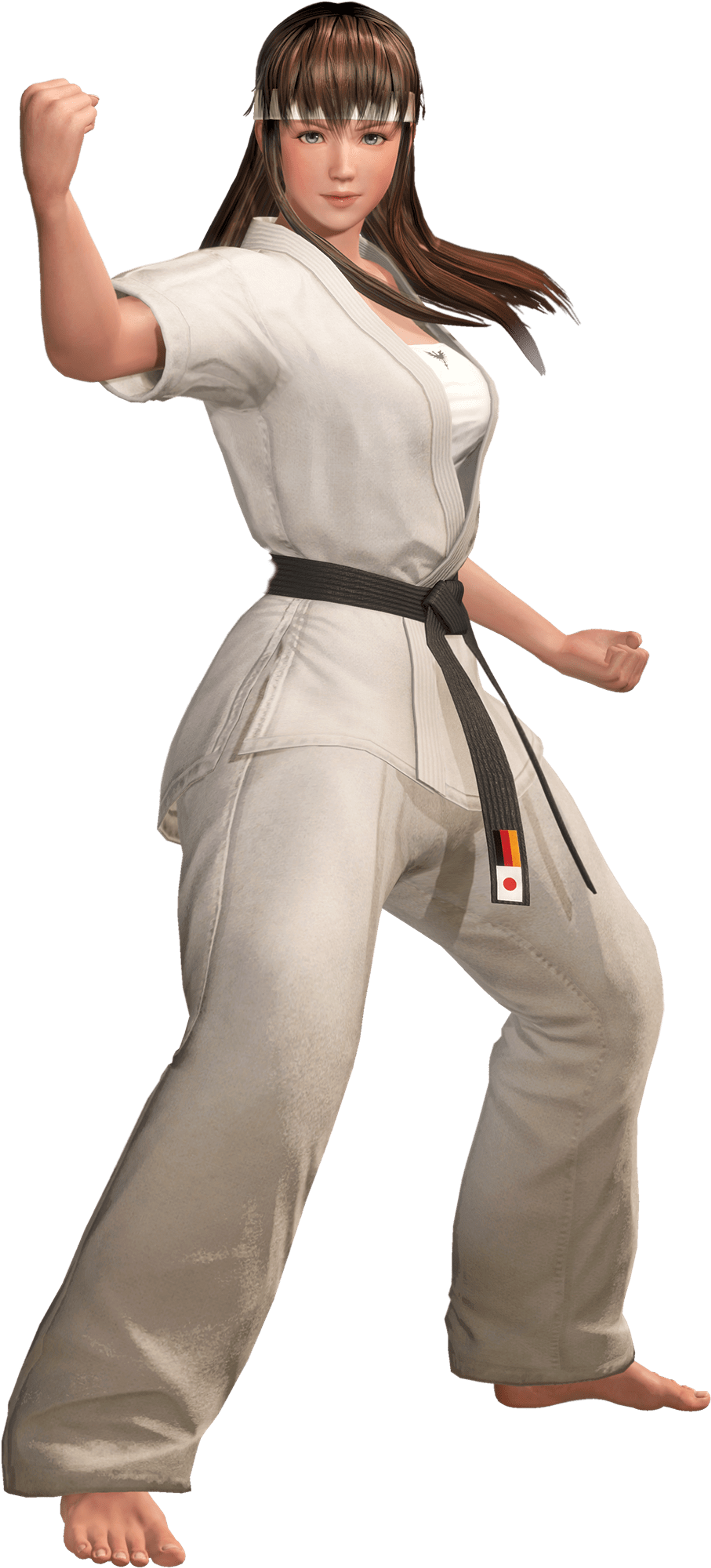 A young woman in a white karate uniform in a fighting stance