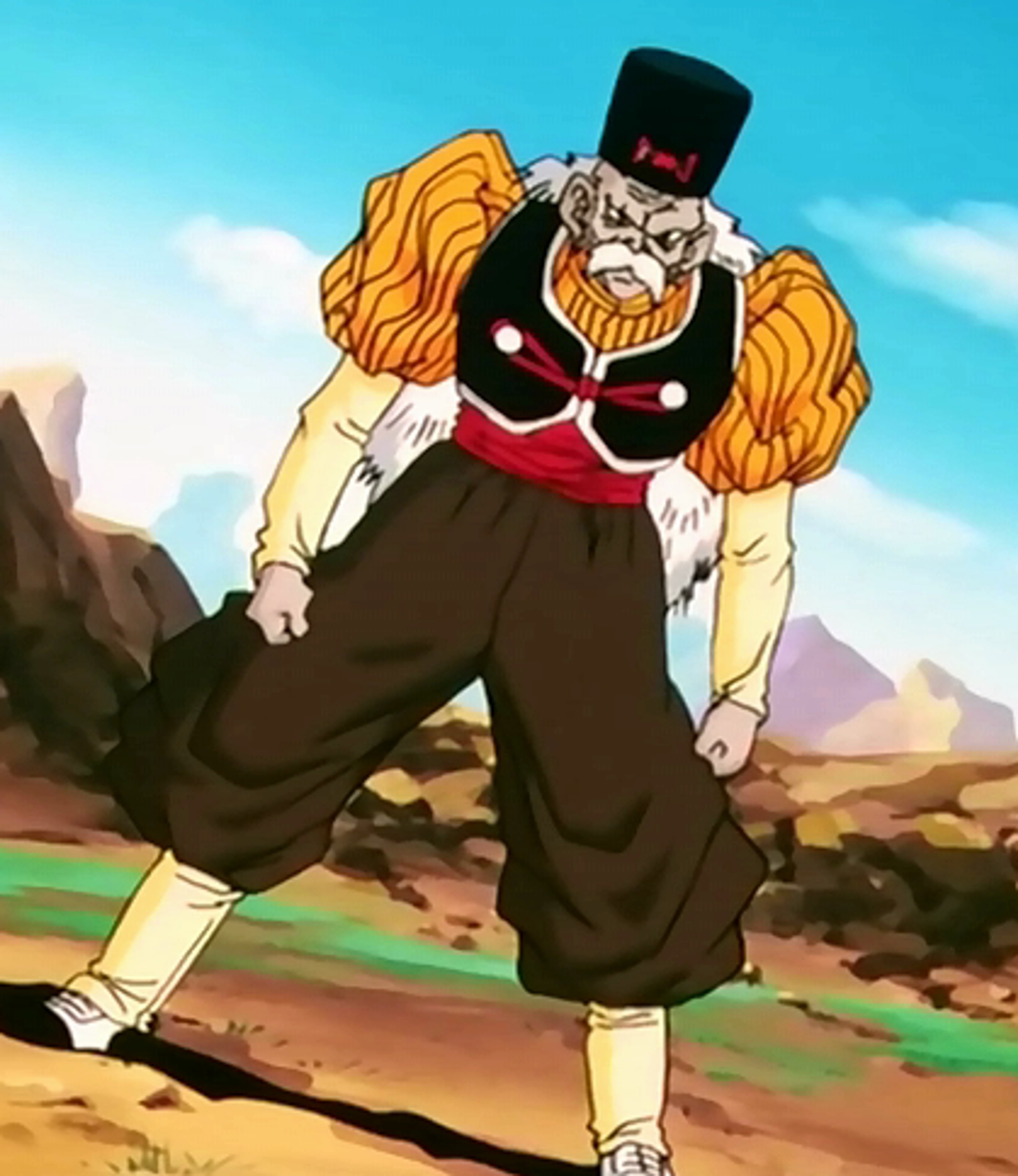 An older, muscular man with a stern expression wearing a black hat and red scarf in a desert or mountainous setting.