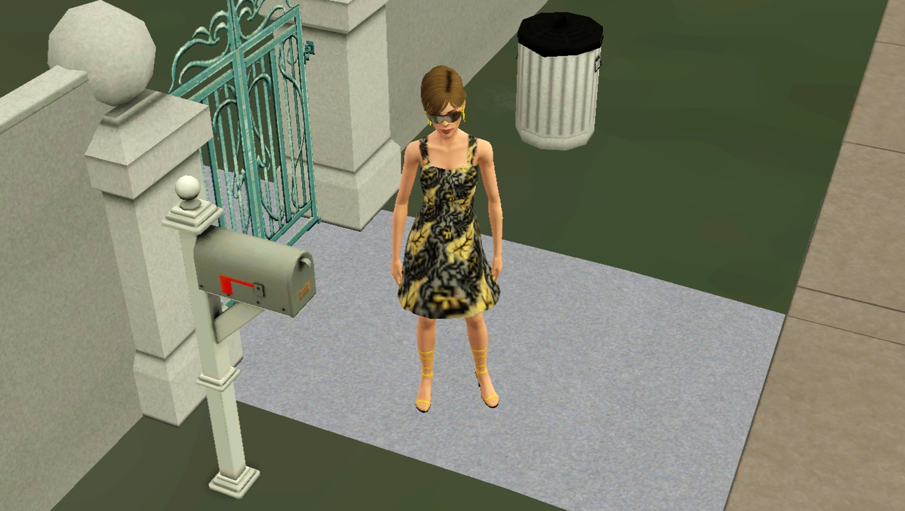 A young woman with long brown hair wearing a floral print dress, standing in a residential setting.