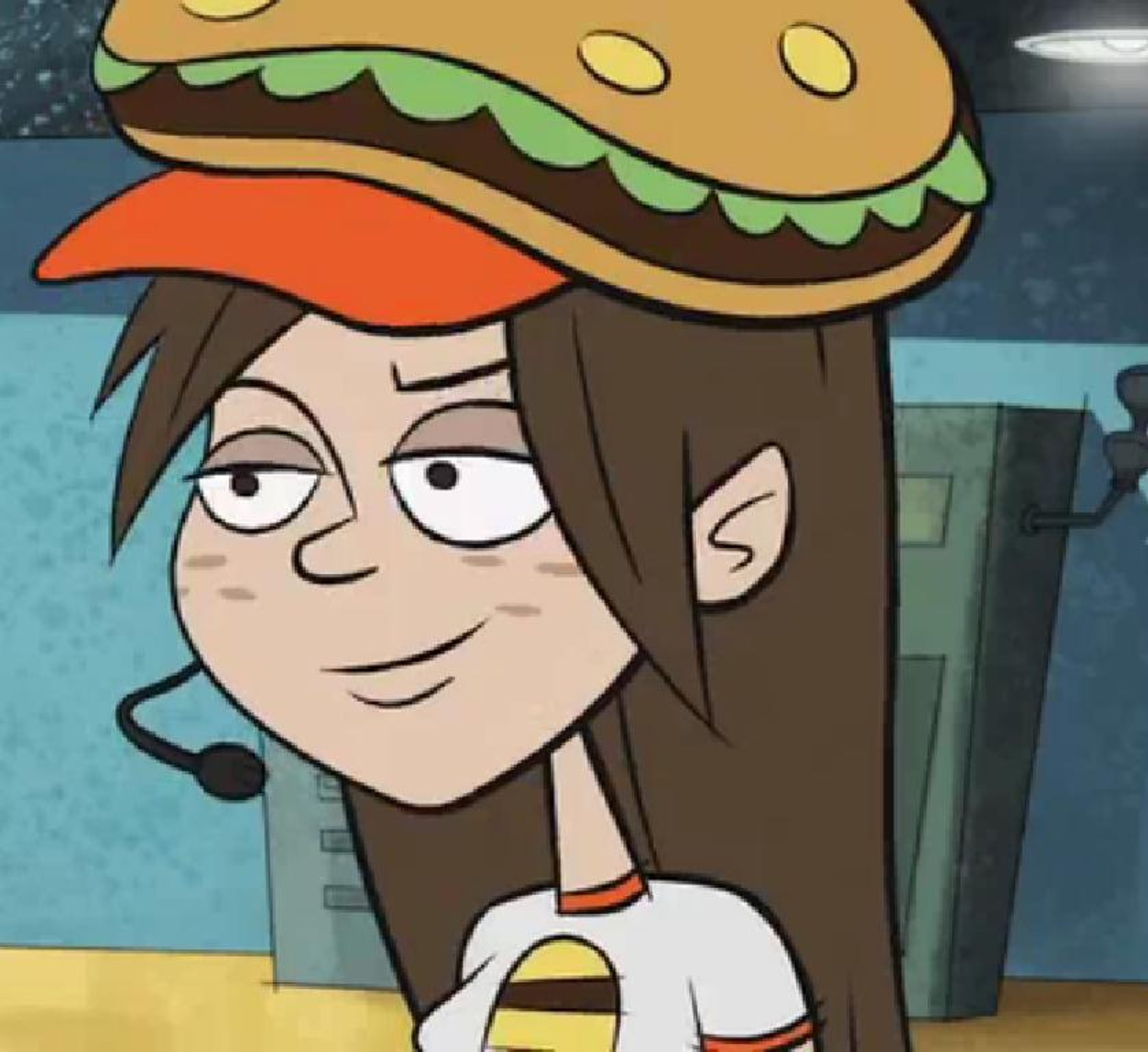 A cartoon image of a young woman with brown hair wearing a red hat and green shirt