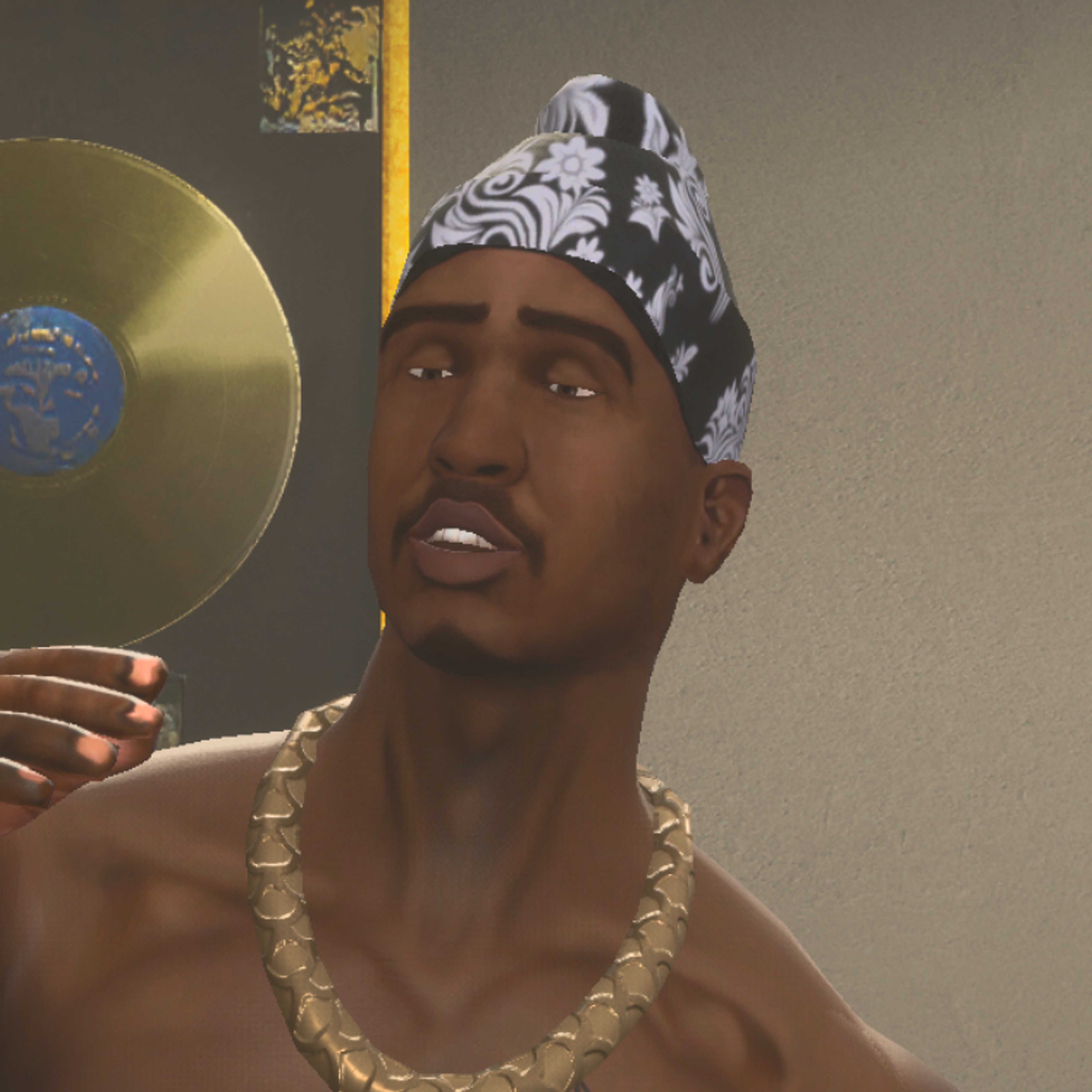 A man wearing a patterned headband and gold jewelry, shirtless and holding a vinyl record or CD.