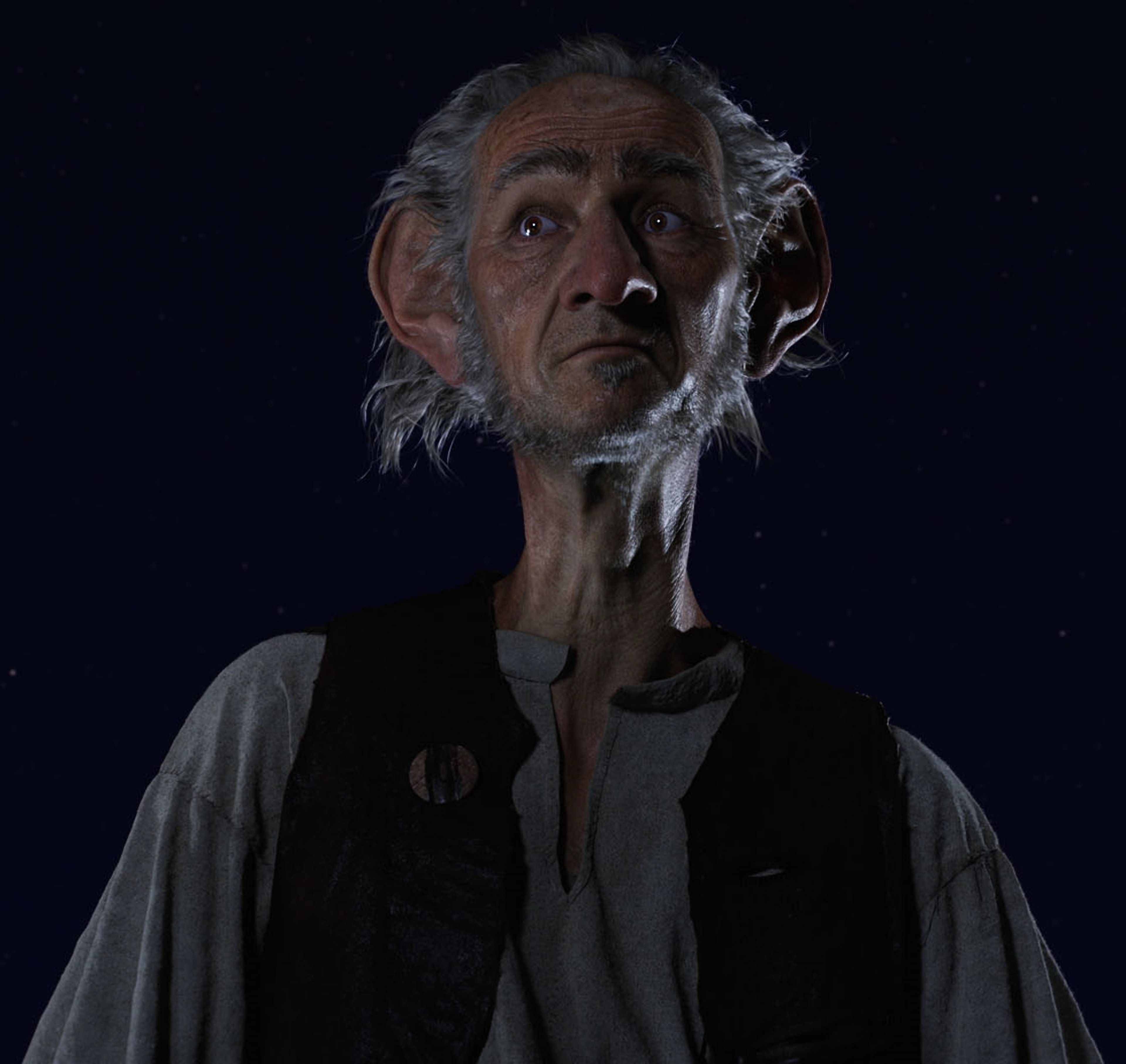 An elderly, bearded man with a kind expression
