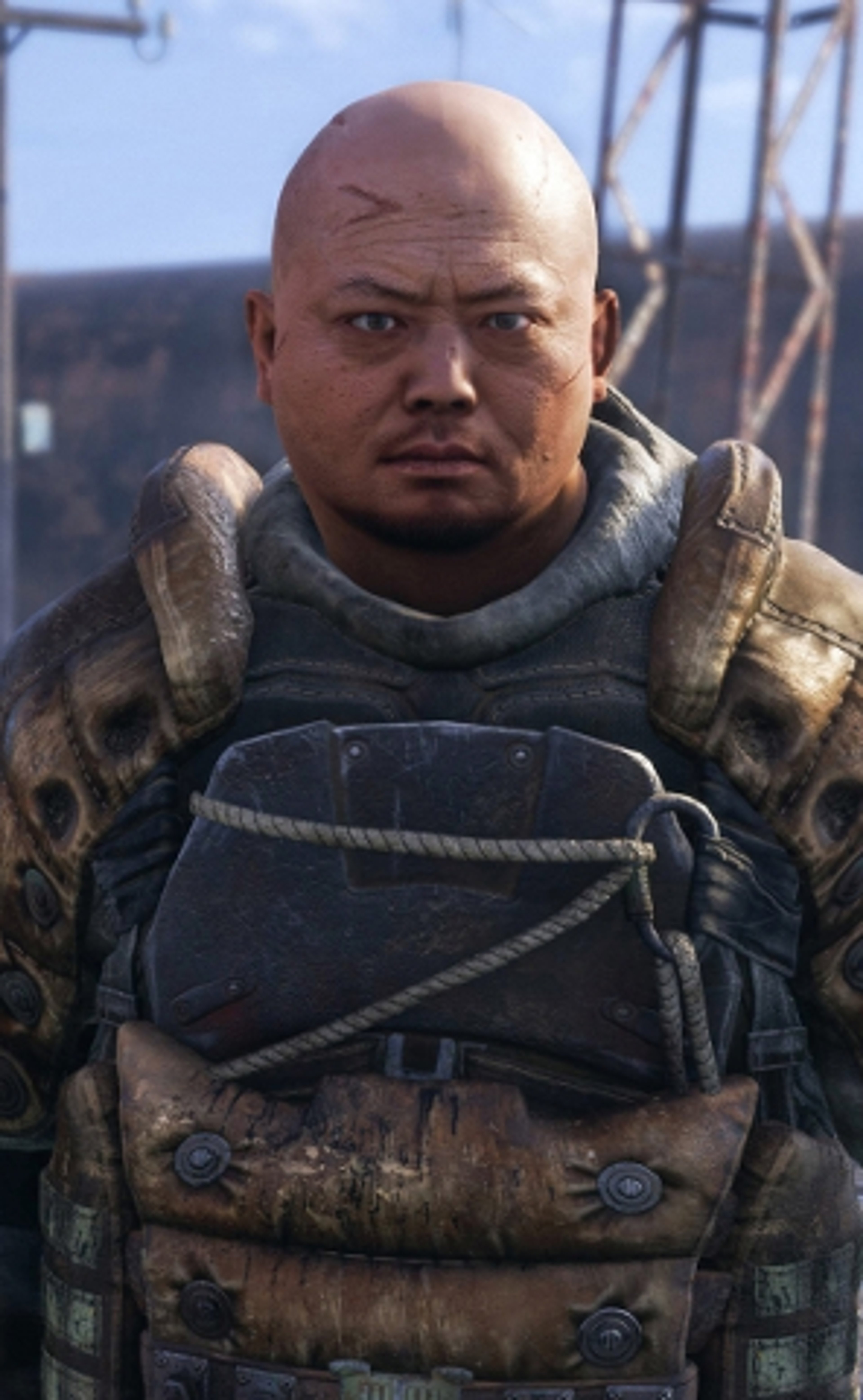 A man in military uniform with a serious expression