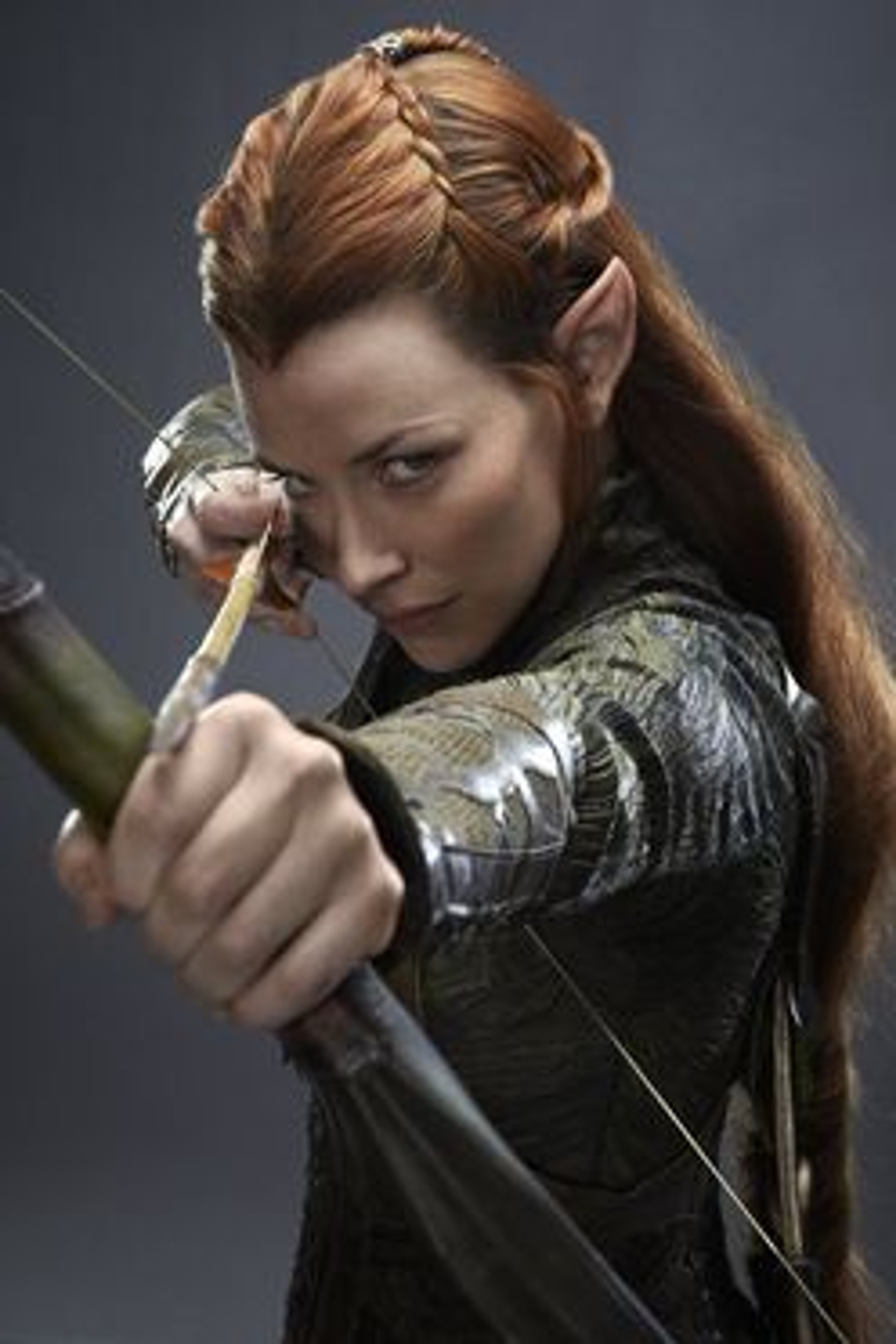 A female Elven warrior with red hair and a bow and arrow, in a defensive stance.