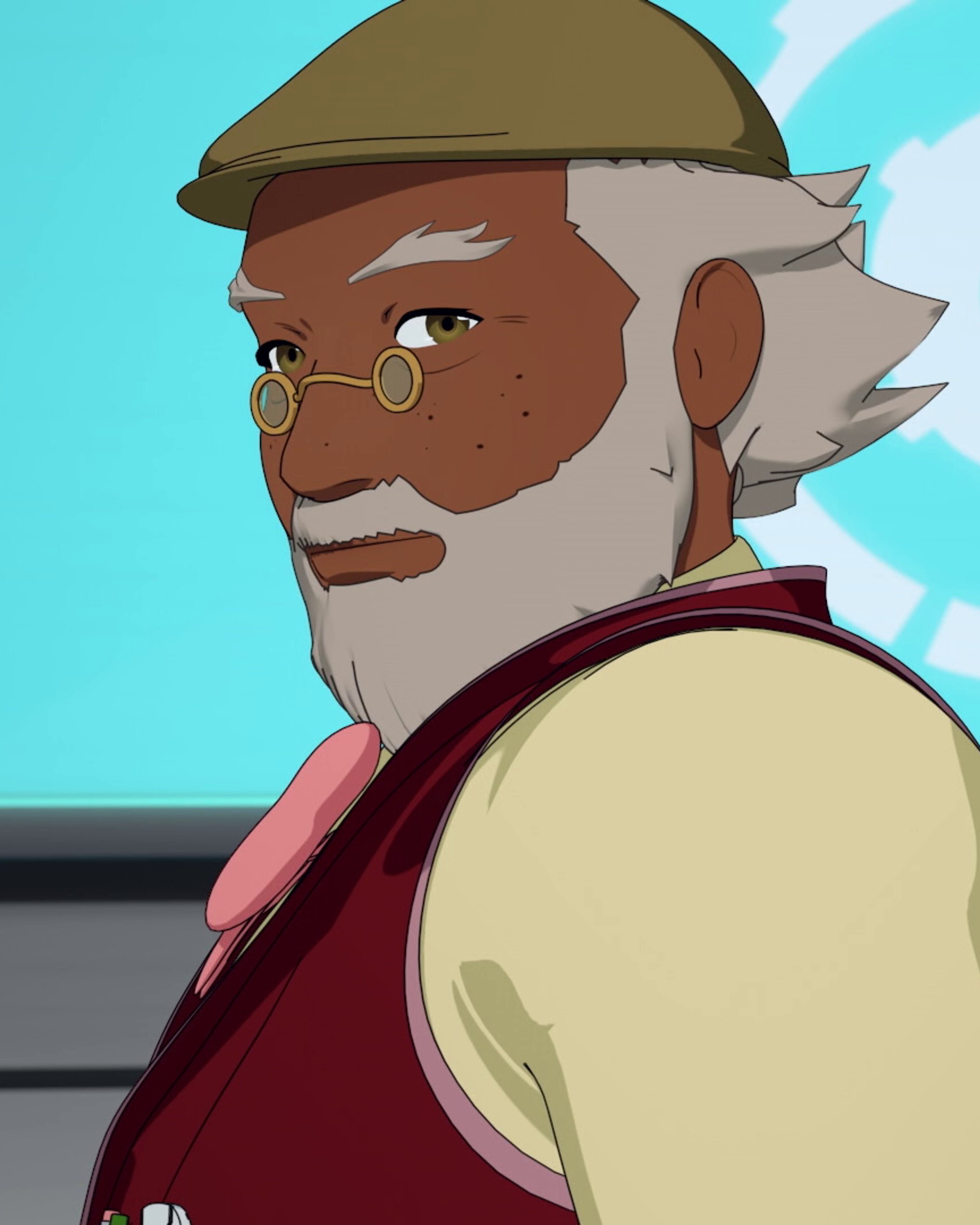 An older man with dark skin, balding white hair, and glasses, seated in a mechanical mobility chair.