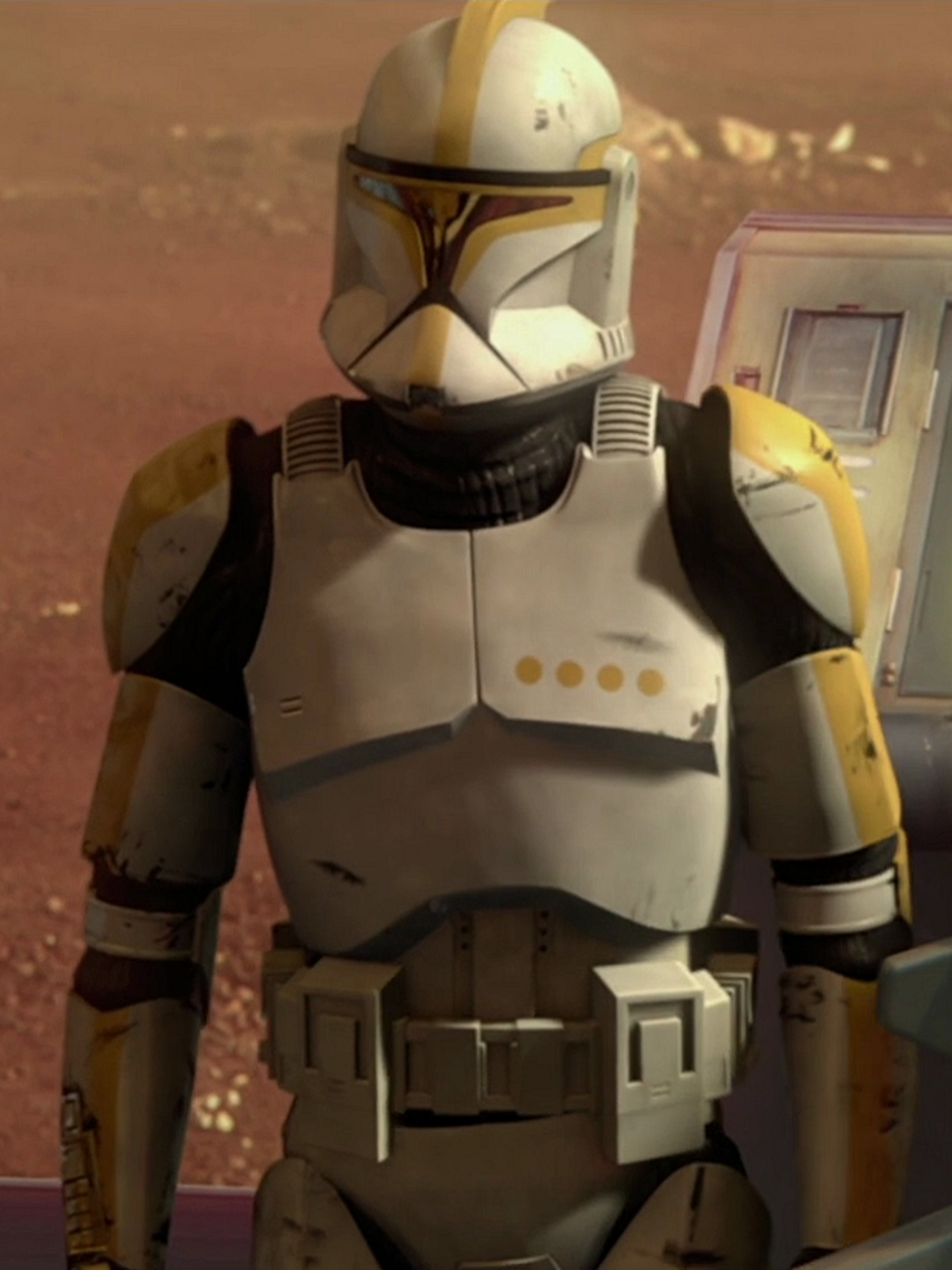 A clone trooper commander from the Star Wars universe, wearing distinctive yellow-marked armor.