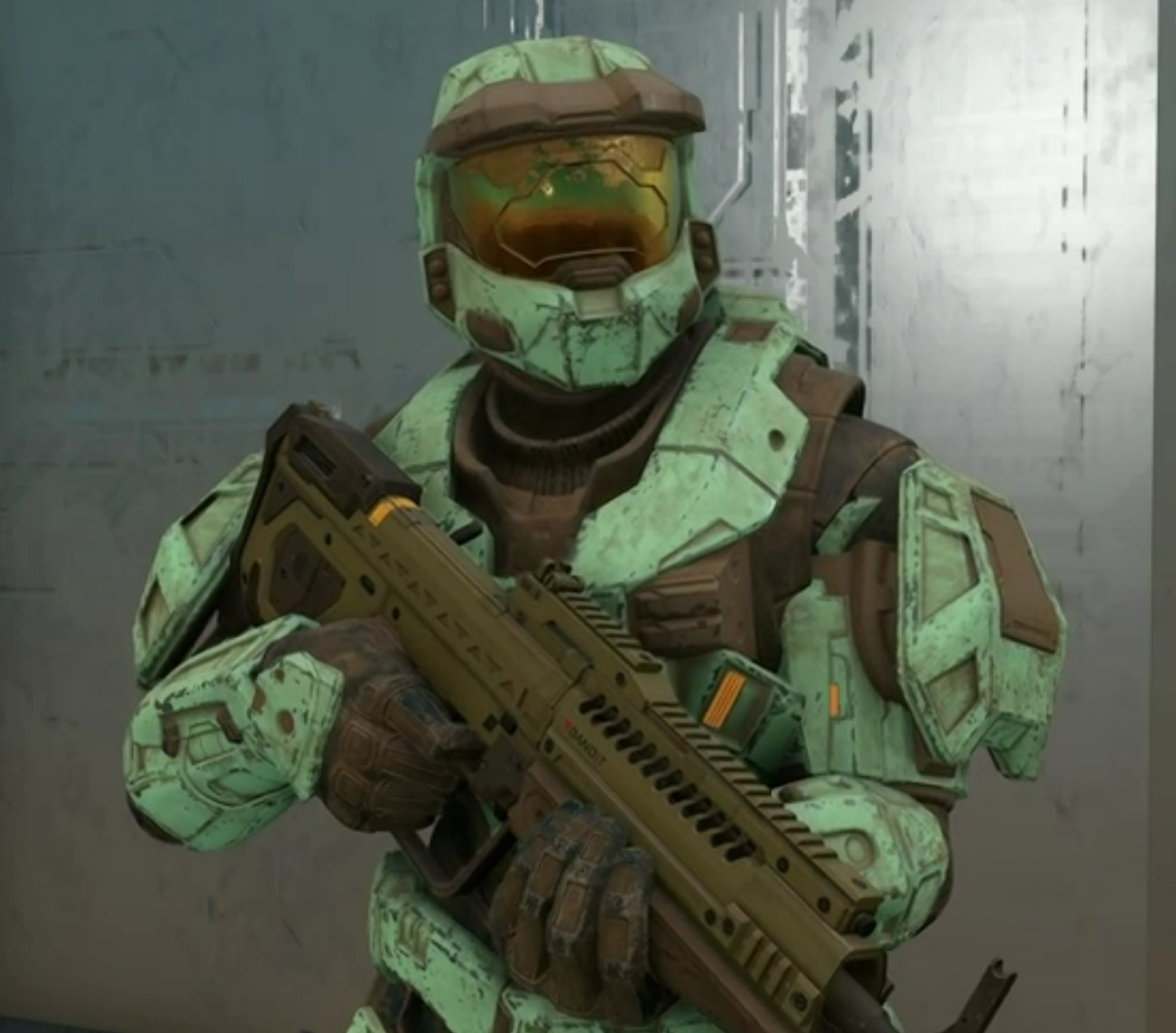 A character in green military armor holding an assault rifle