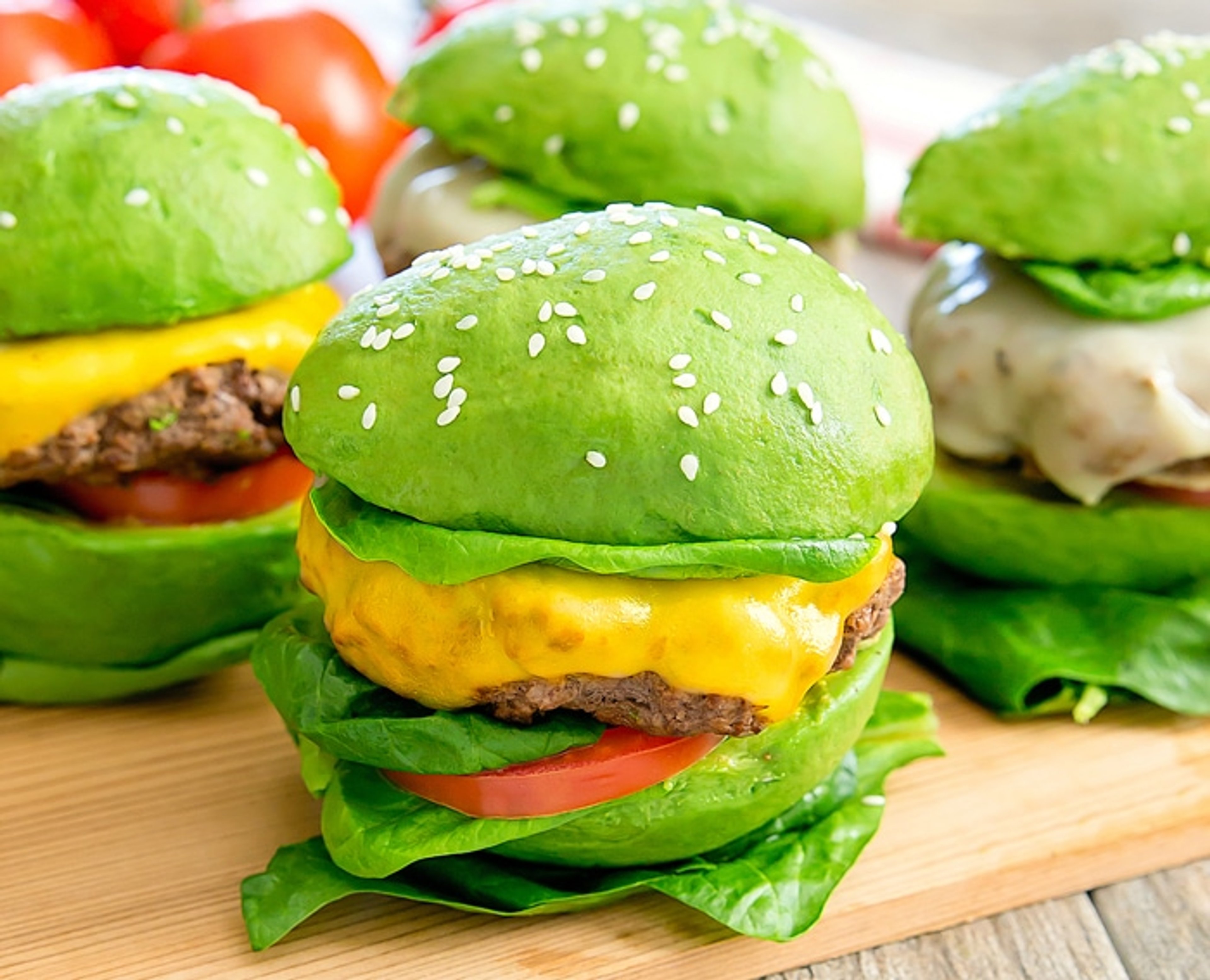 Close-up of hamburger buns with bright green avocado-based buns