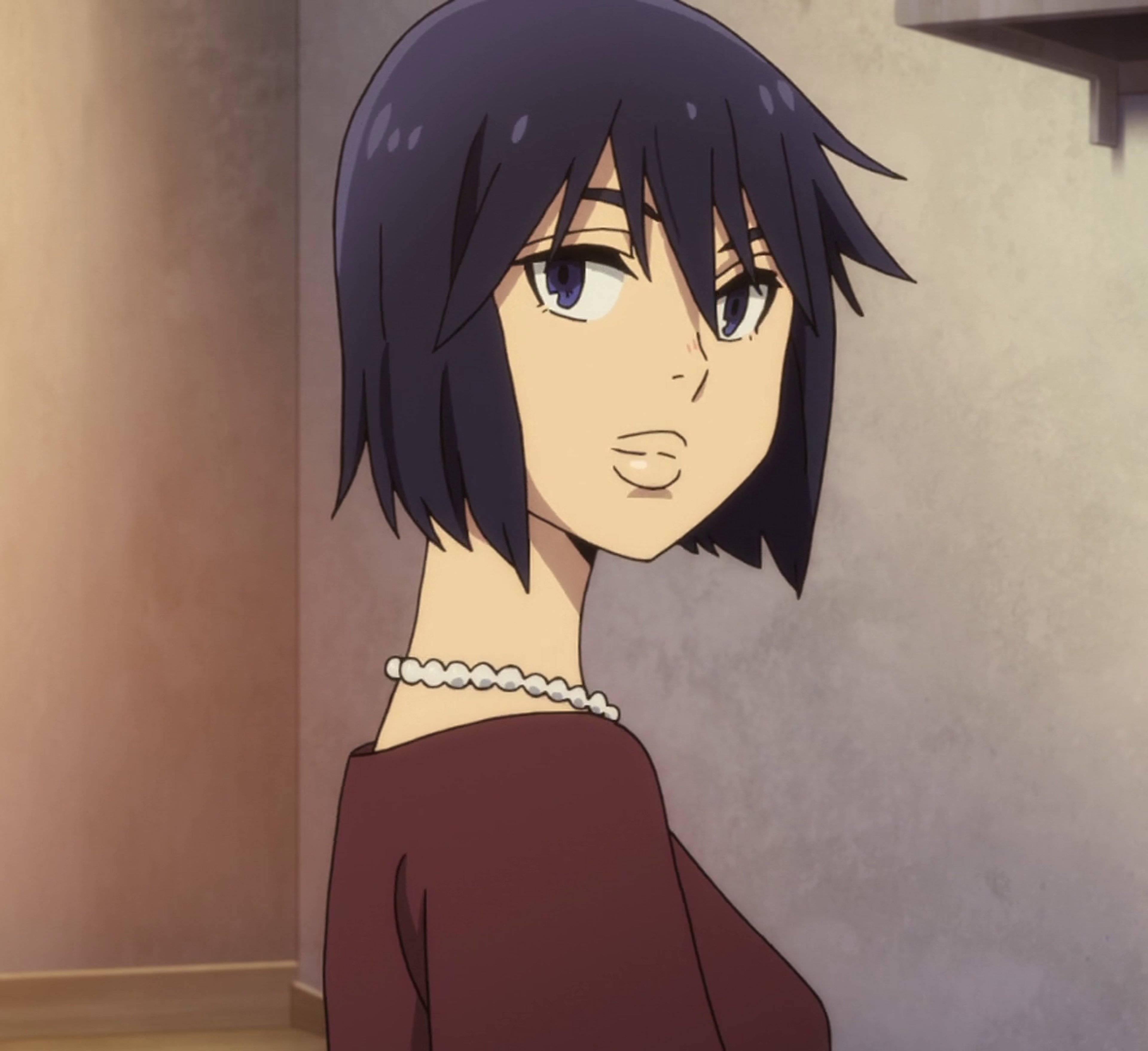 An anime-style character with dark hair and a serious expression, wearing a red sweater or shirt.