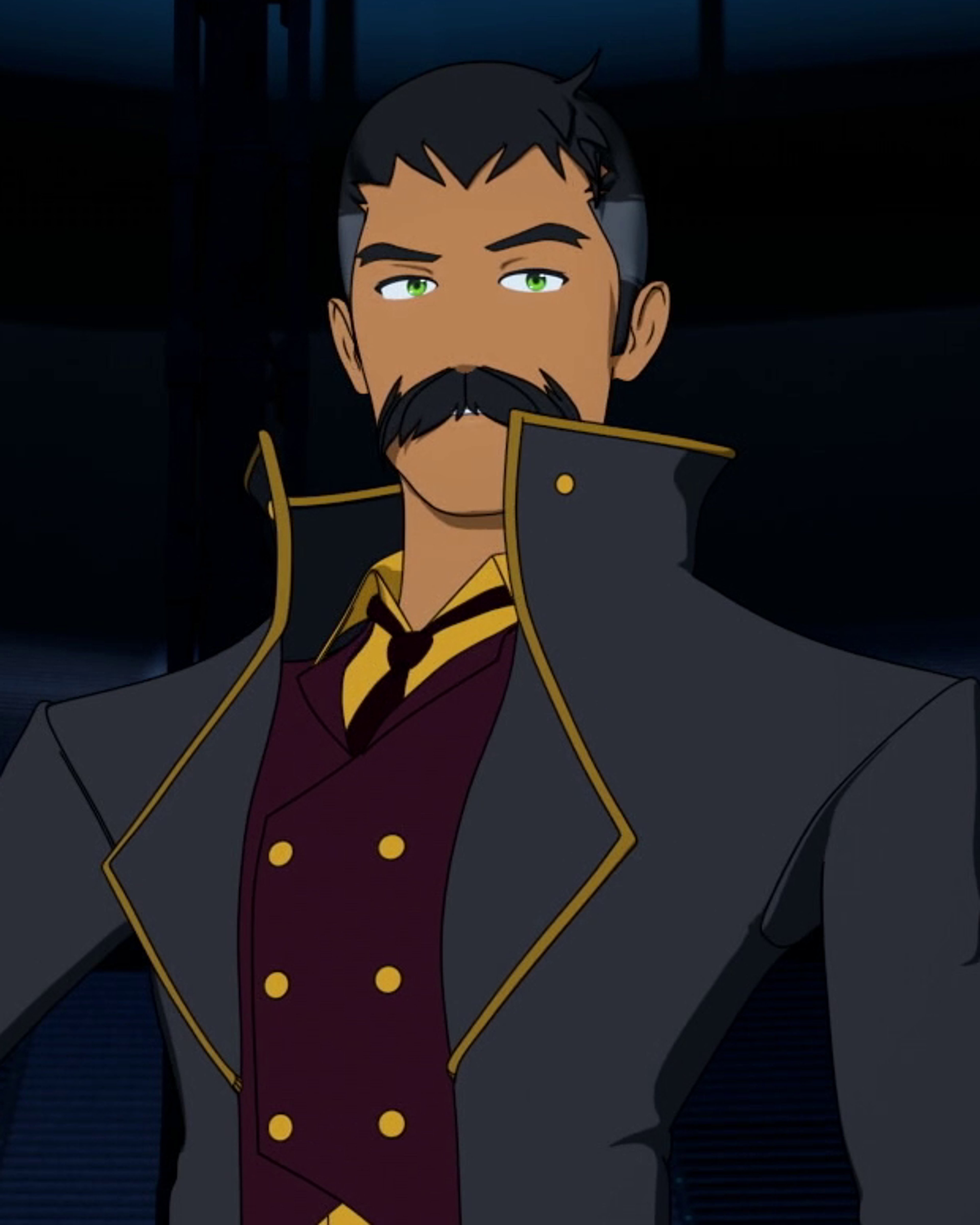 A middle-aged man with a mustache and formal attire