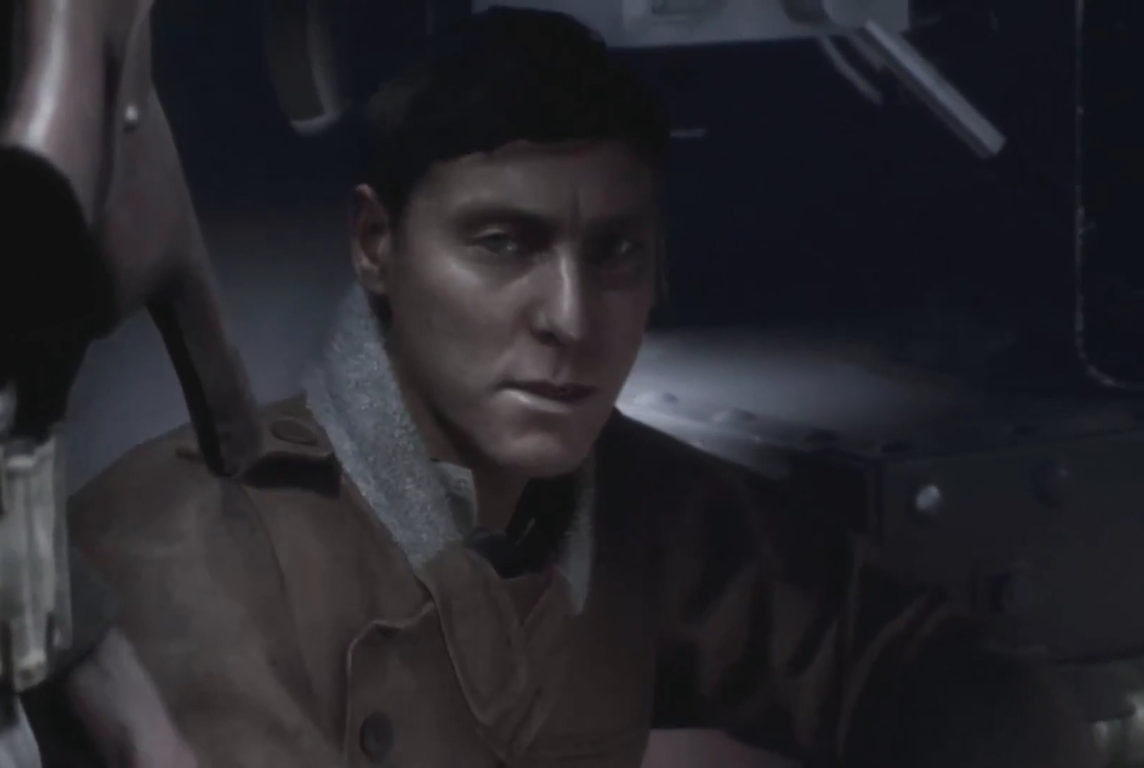 A middle-aged man with a weathered face wearing a military uniform, likely a tank gunner in the British Army during World War I.