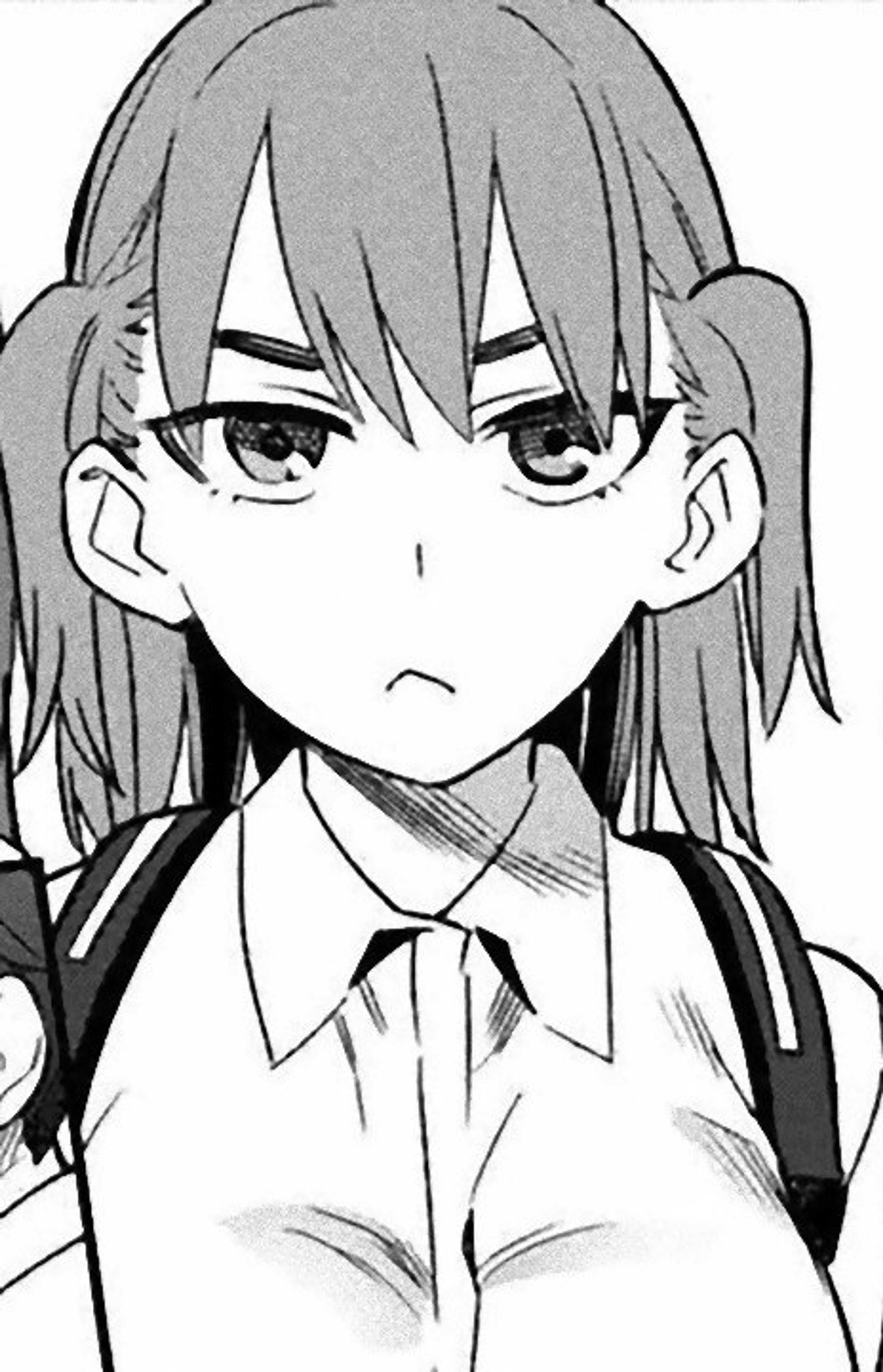 A serious-looking, athletic high school girl with brown hair in pigtails