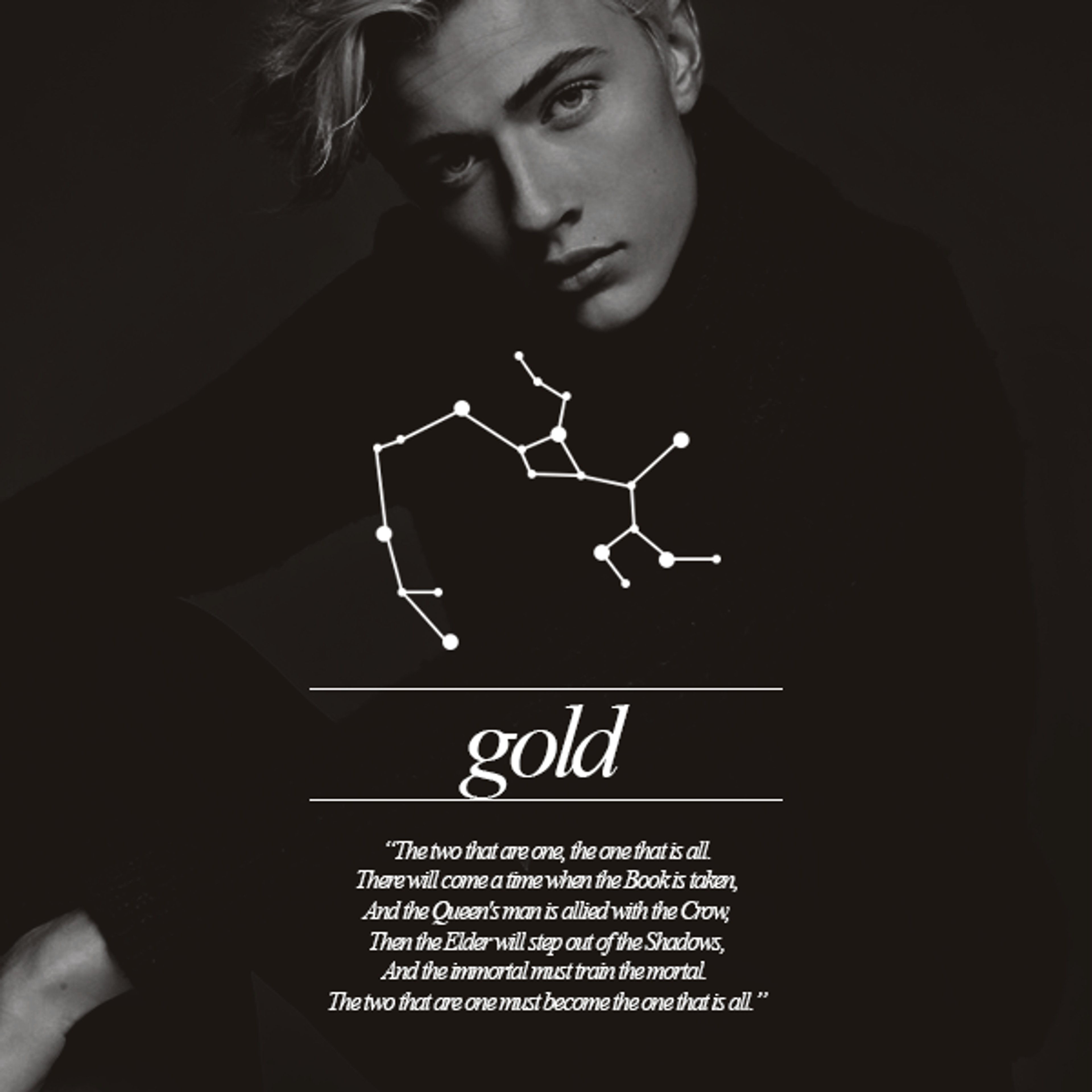 A close-up portrait of a young man with blonde hair and blue eyes against a dark background.