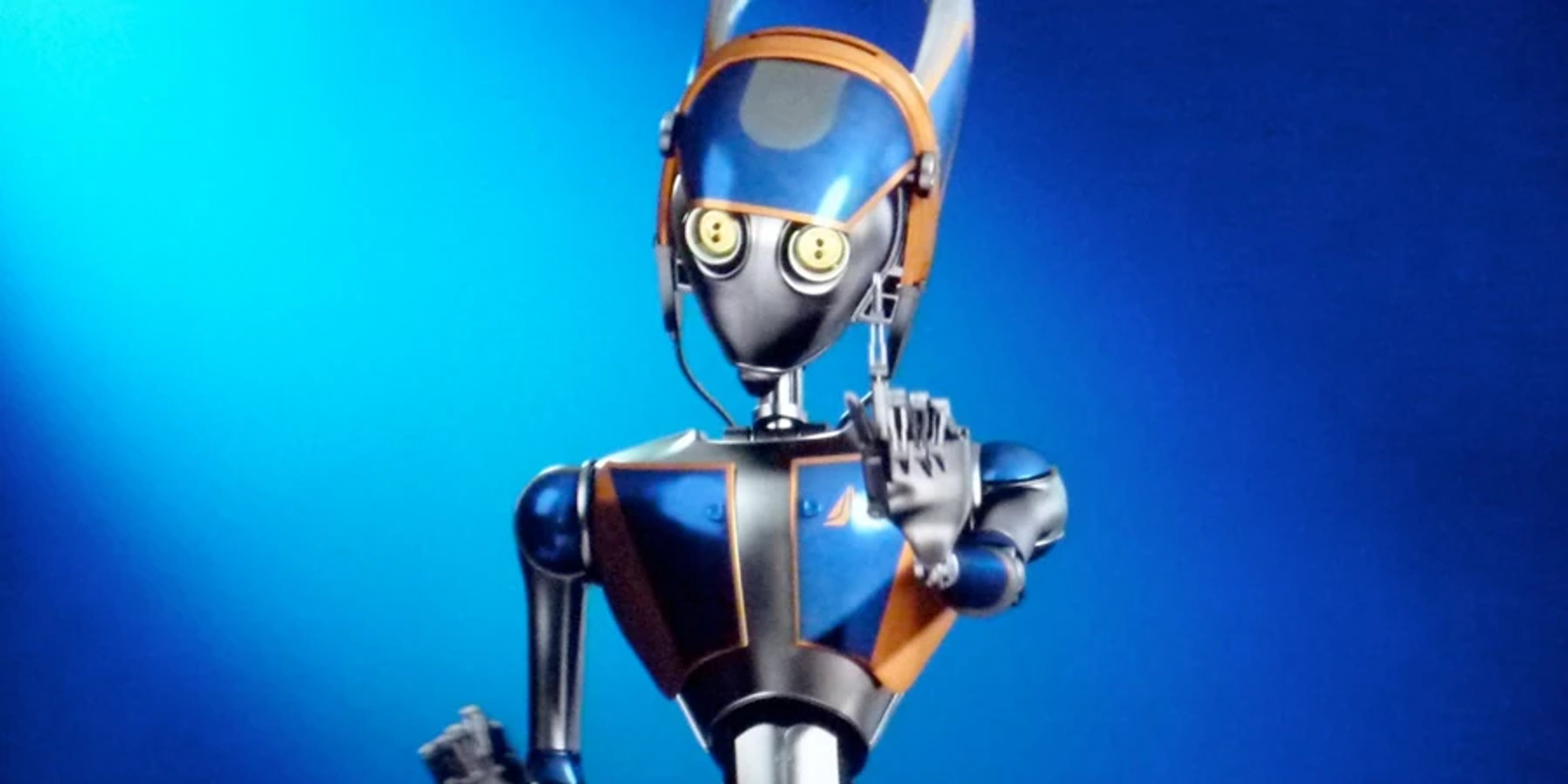 A metallic robot character with a yellow photoreceptor and a professional, corporate appearance.