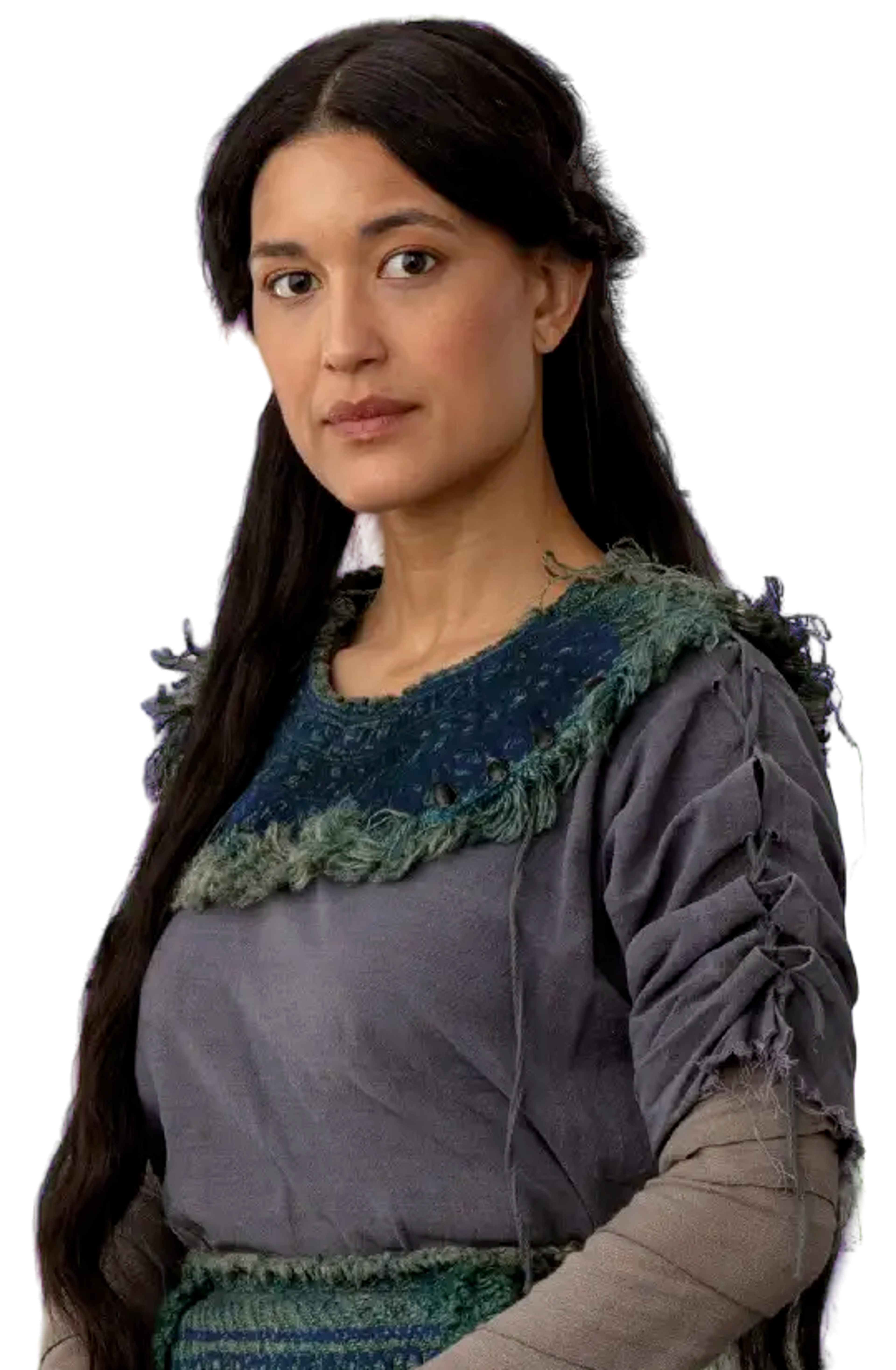 A woman with long dark hair wearing a gray dress