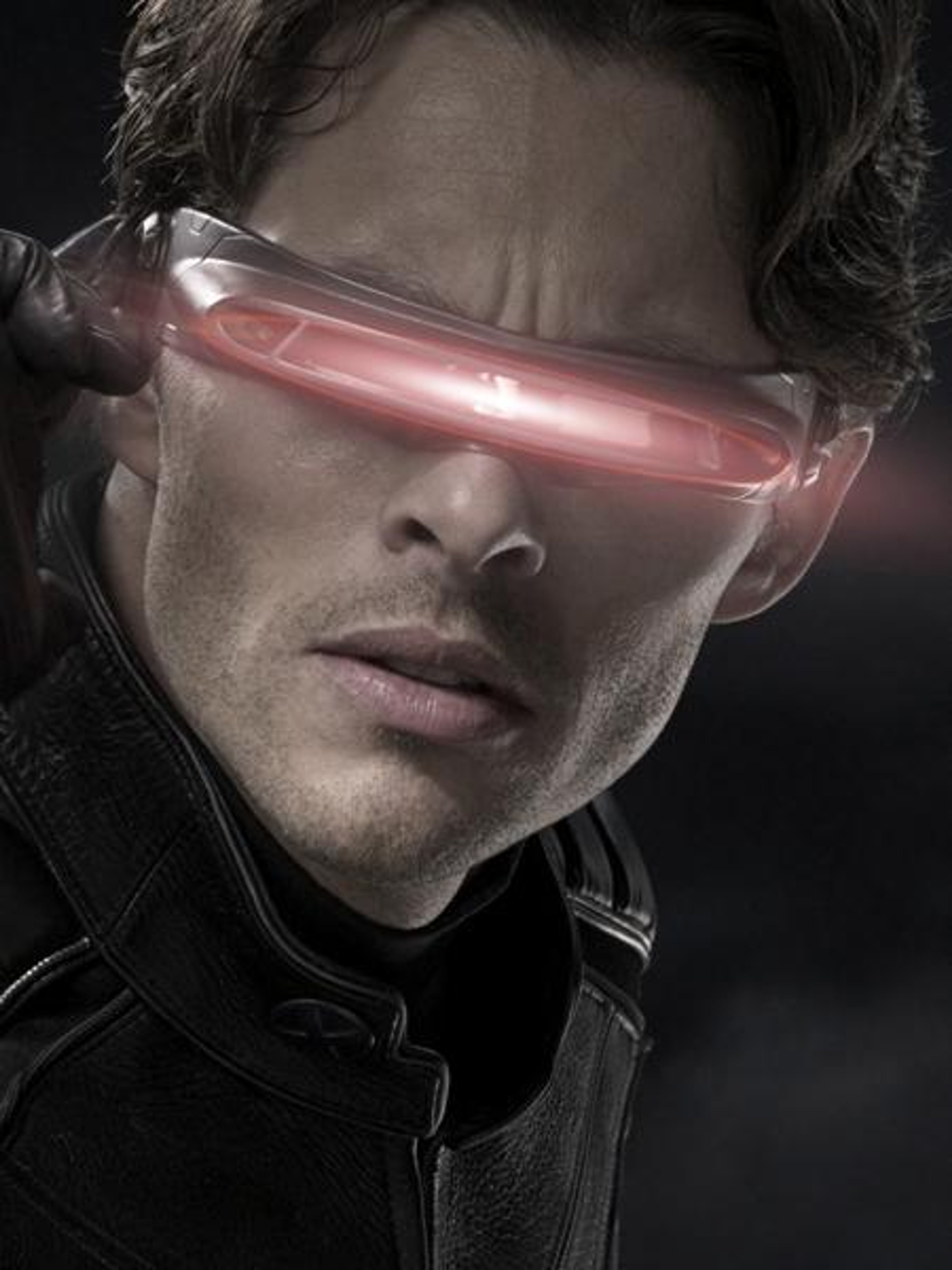 A man with a visor-like device covering his eyes, emitting a red energy beam
