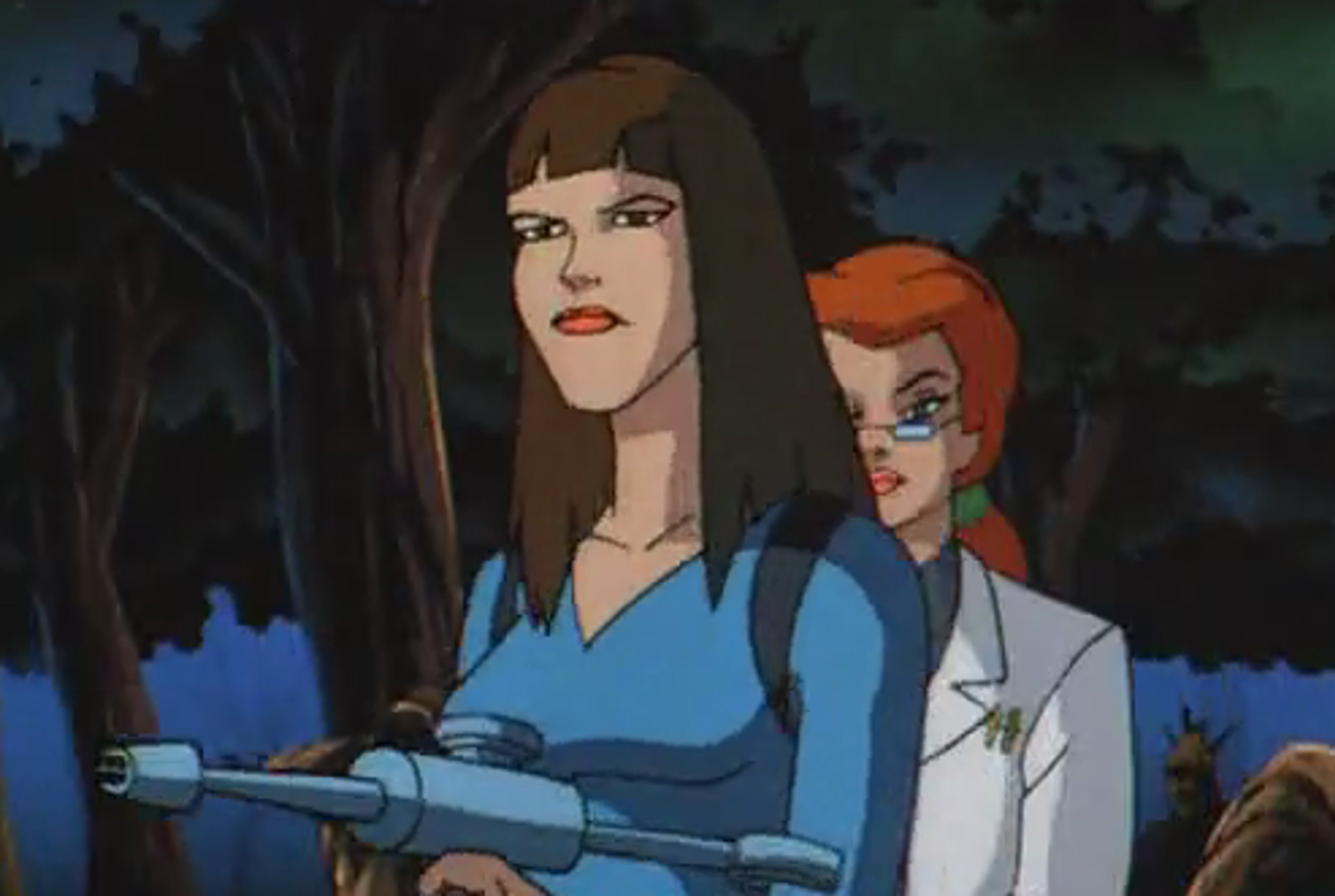 A young woman with dark hair wearing a blue outfit and holding a weapon or device in a nighttime, forested setting.
