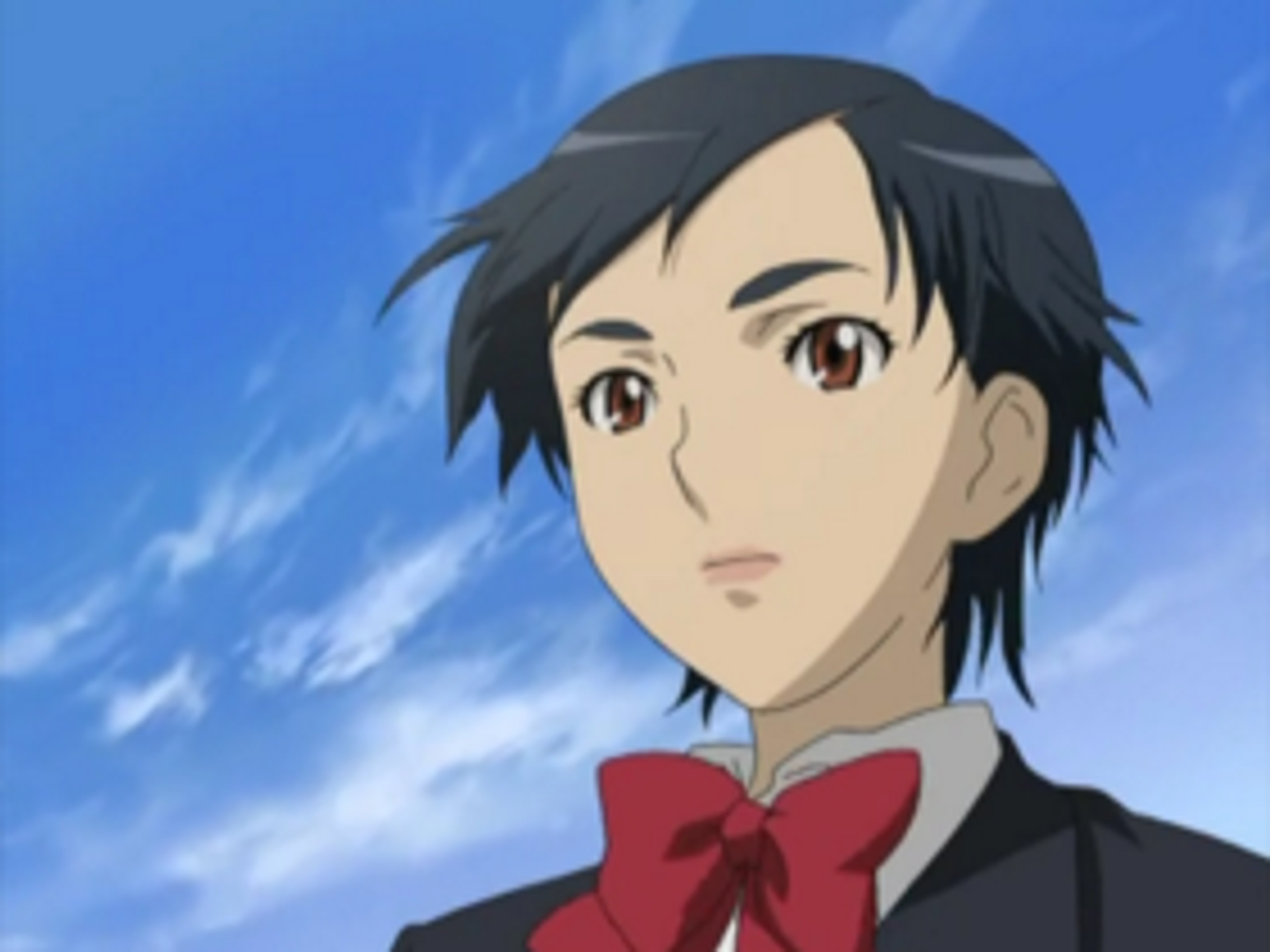 An anime-style character with dark hair wearing a red bow tie and black suit