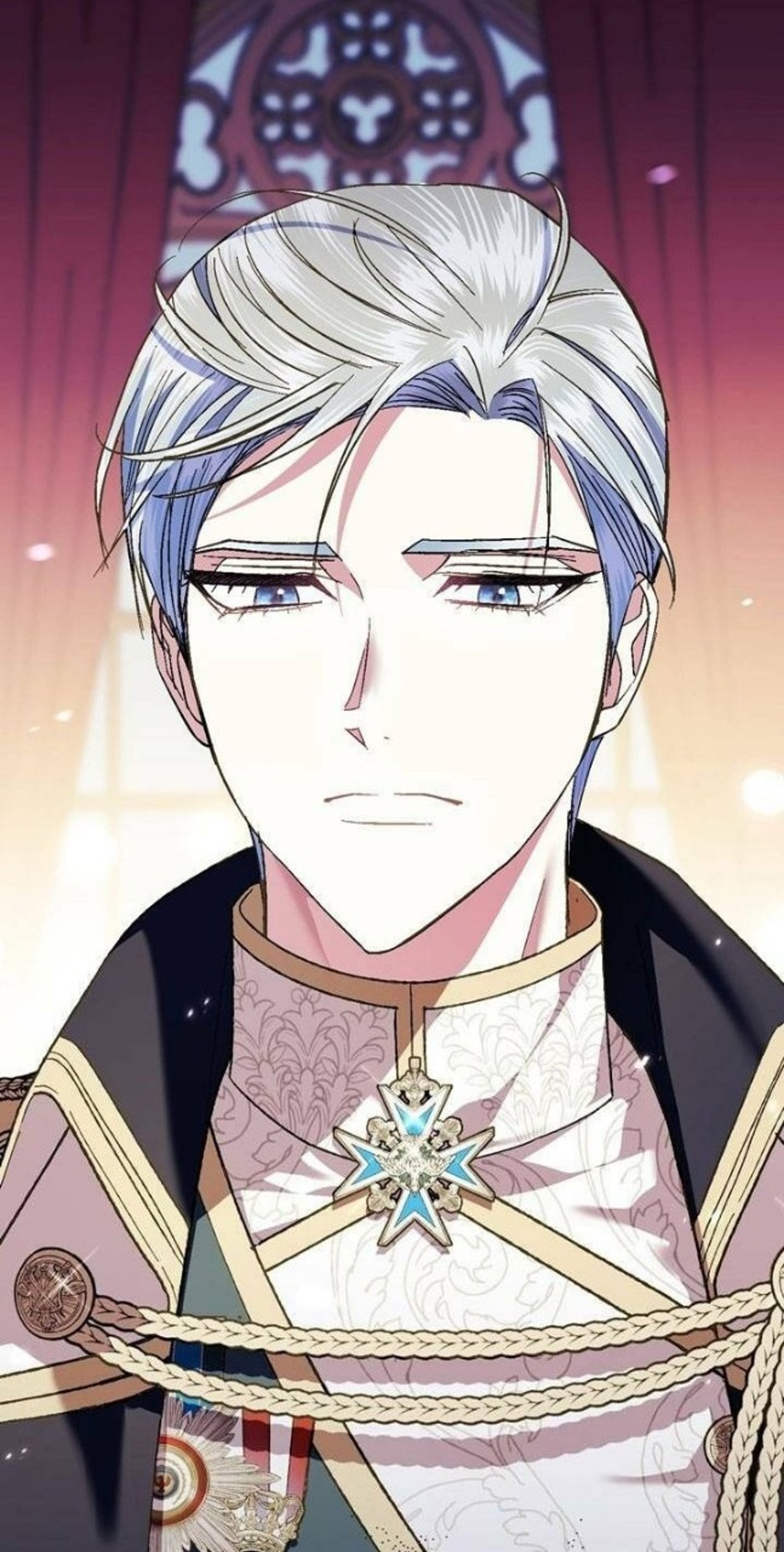 A serious-looking man with silver hair and blue eyes, wearing an ornate jacket with a circular pendant.