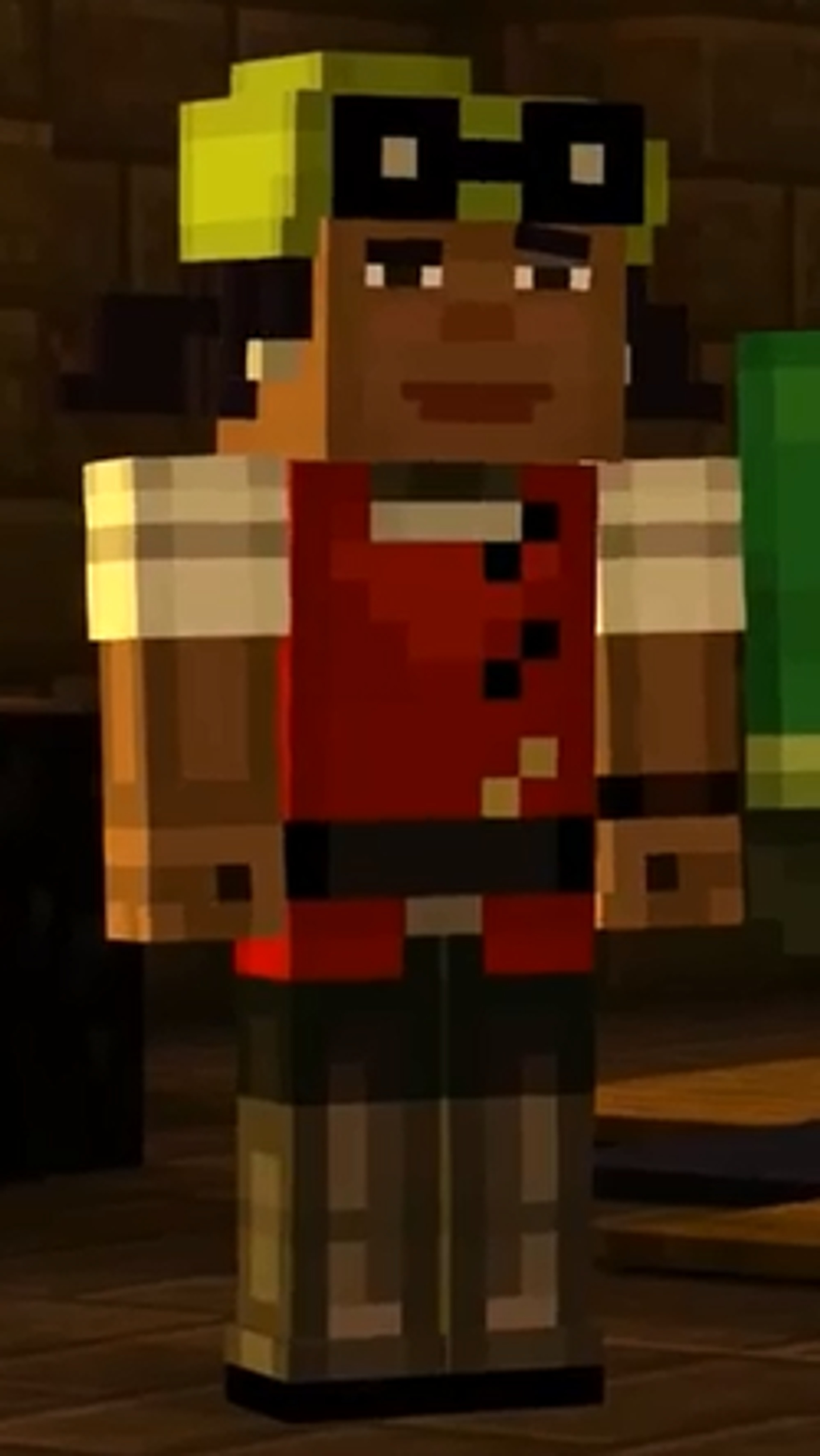 A pixelated character wearing a red tunic, white shirt, black pants, and gray boots, with a lime-green beanie, goggles, pearl earrings, and a brown ring.