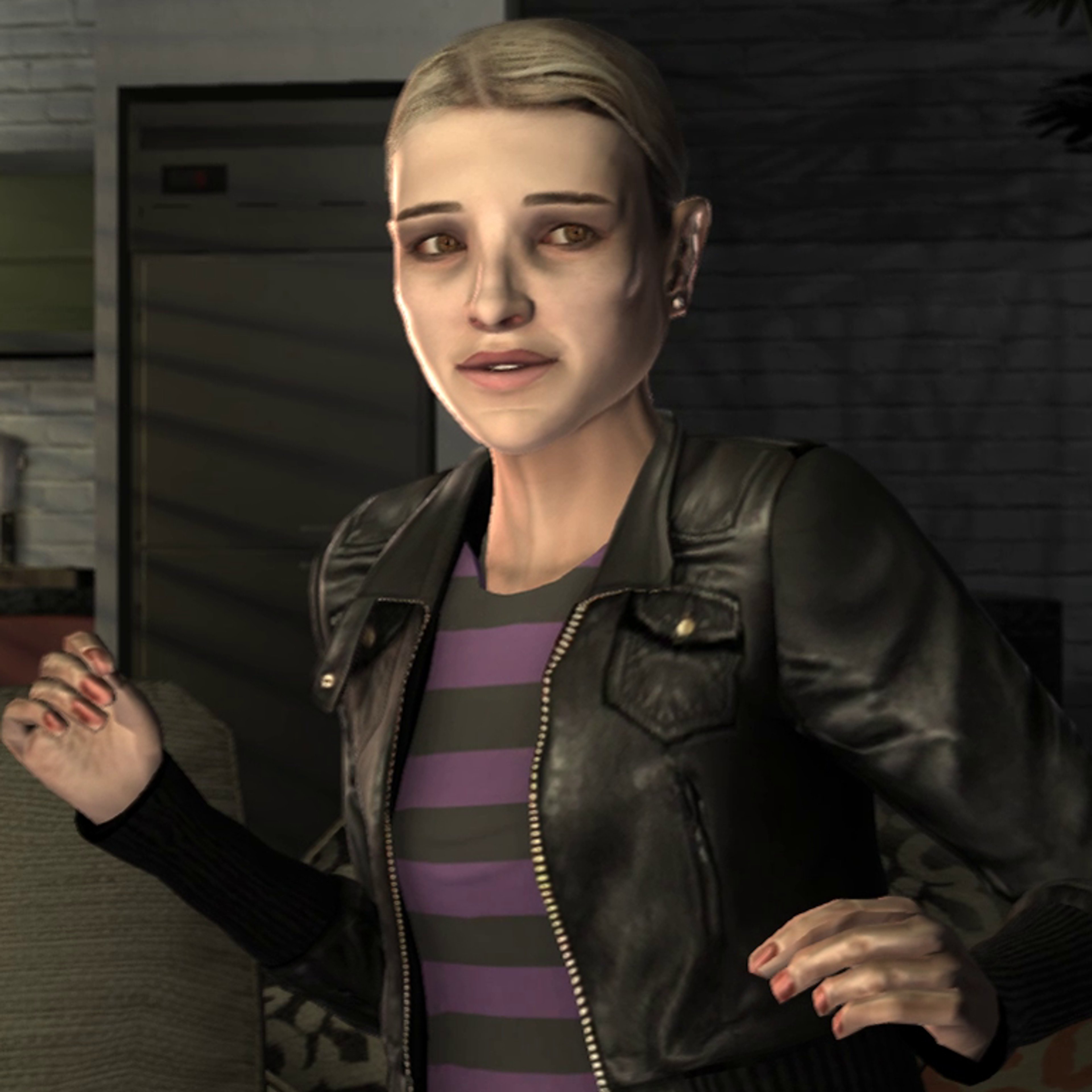 A young woman with blonde hair wearing a black leather jacket