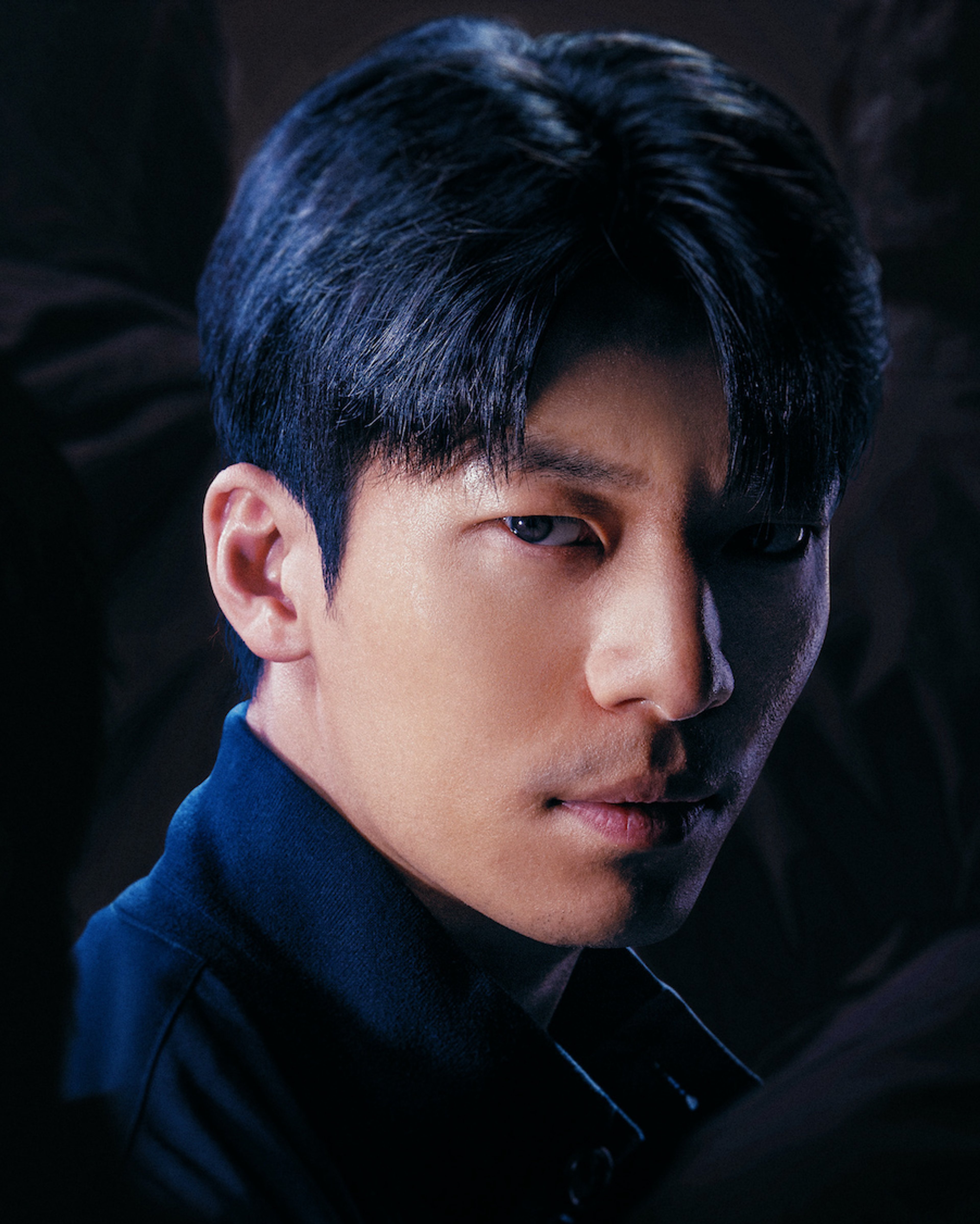 Portrait of a serious-looking young Asian man
