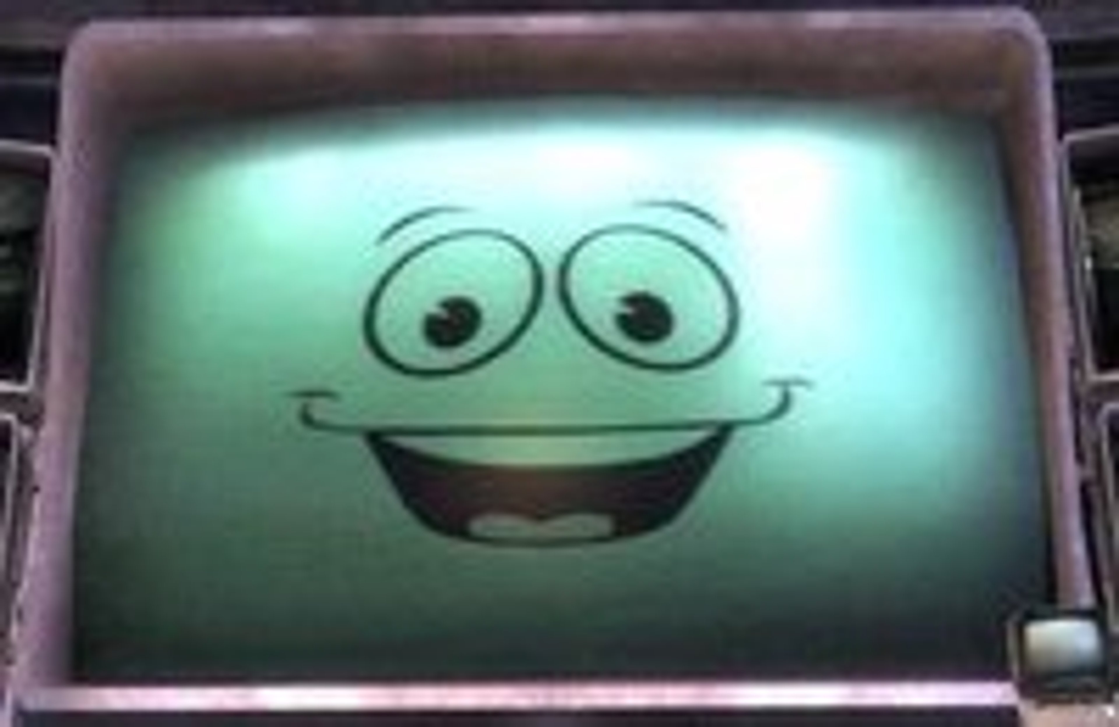 A cartoon robot character with a friendly, smiling expression