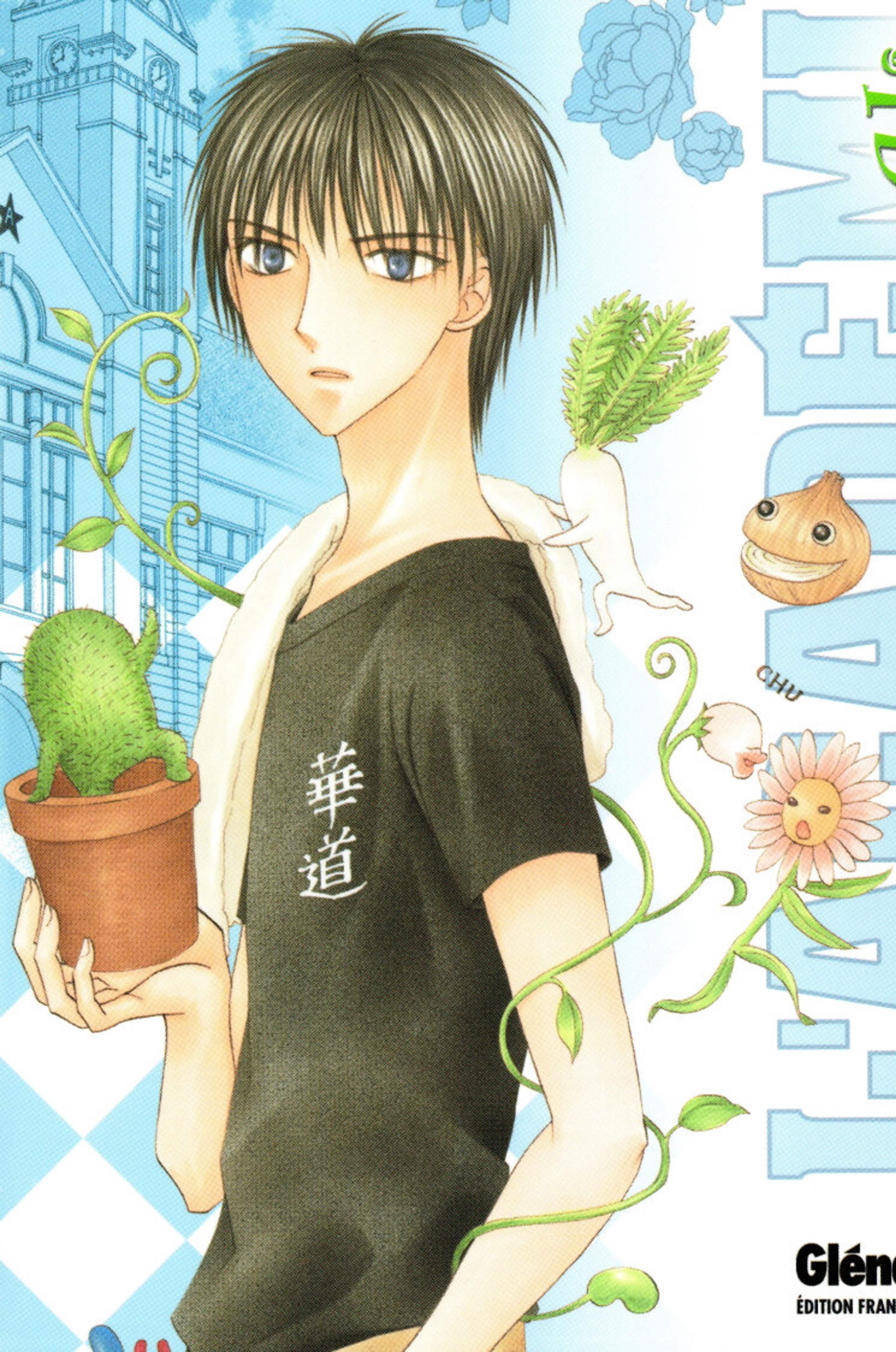 A young man with short brown hair wearing a black shirt and holding a potted plant in front of a city skyline
