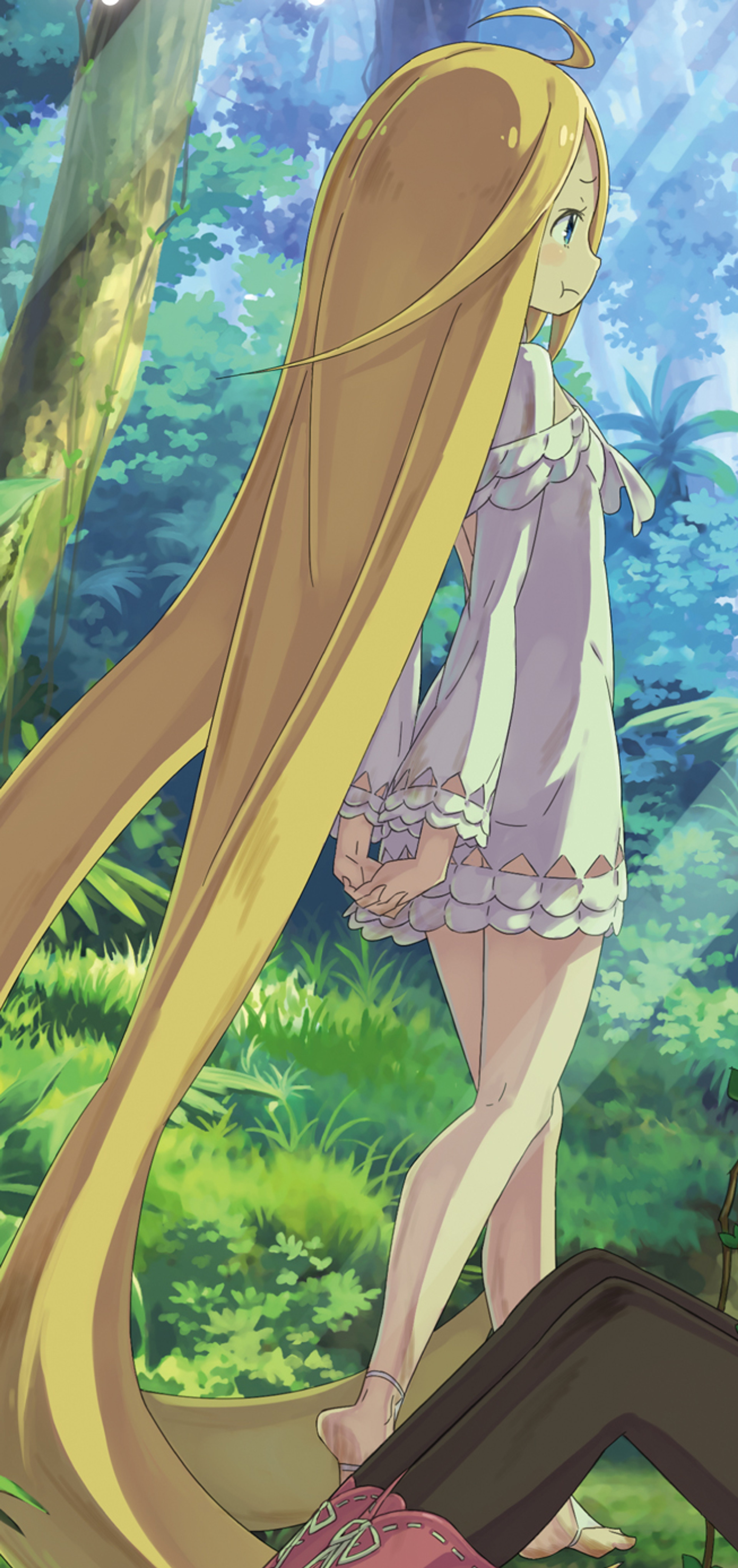 A young woman with long blonde hair in a forest setting