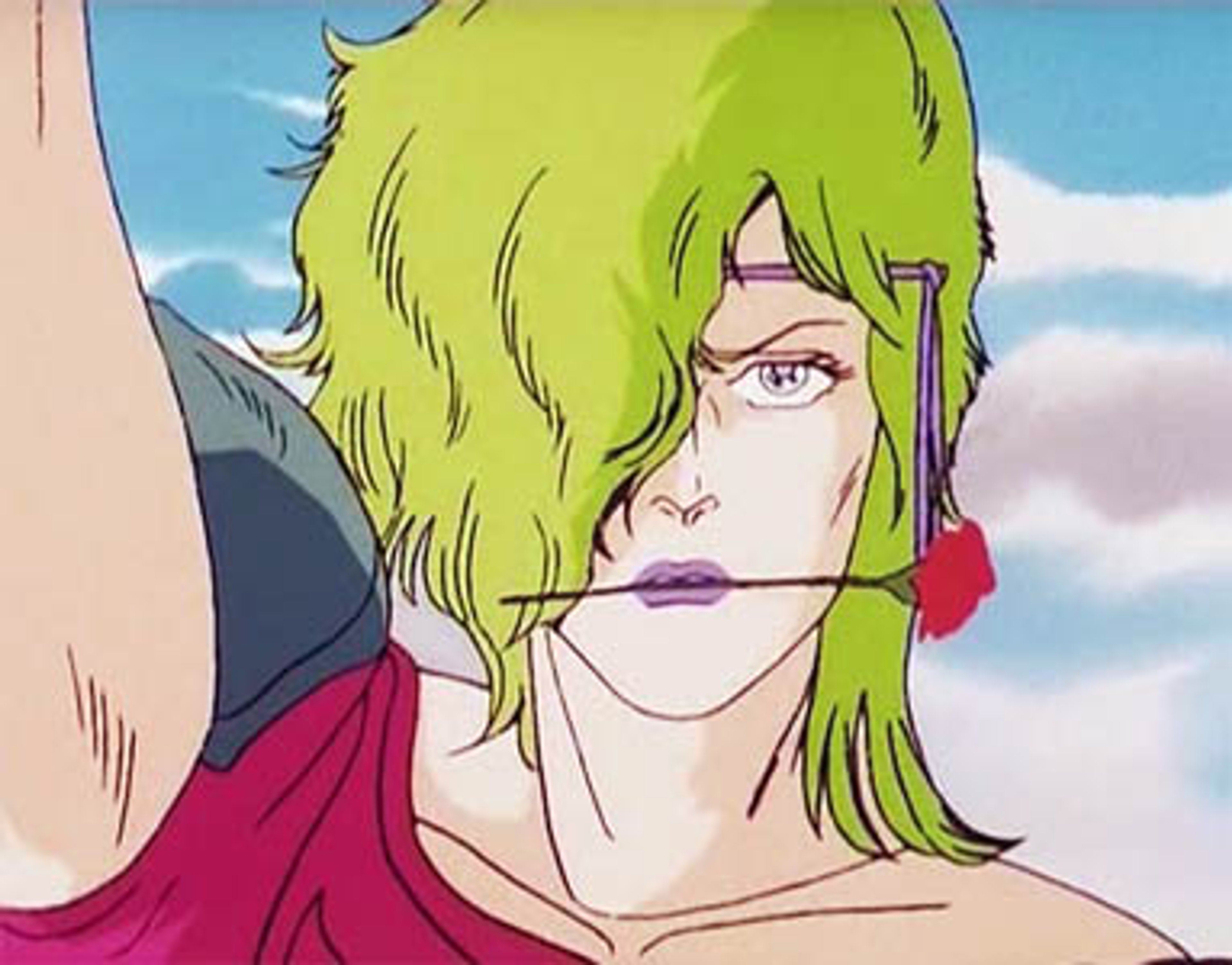 A female martial artist with green hair and a red uniform, standing with a serious expression.