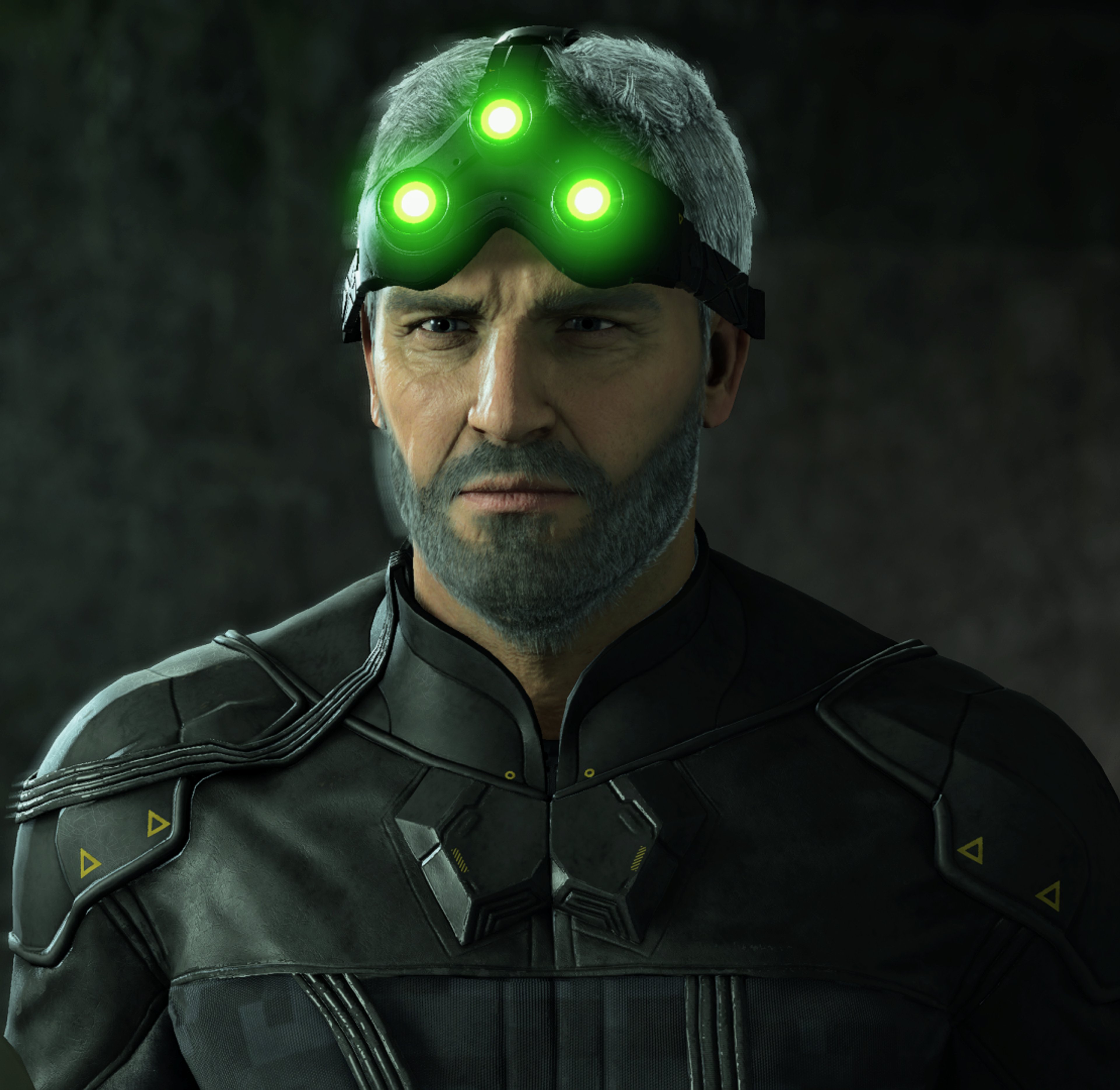 A man in a tactical uniform with night vision goggles