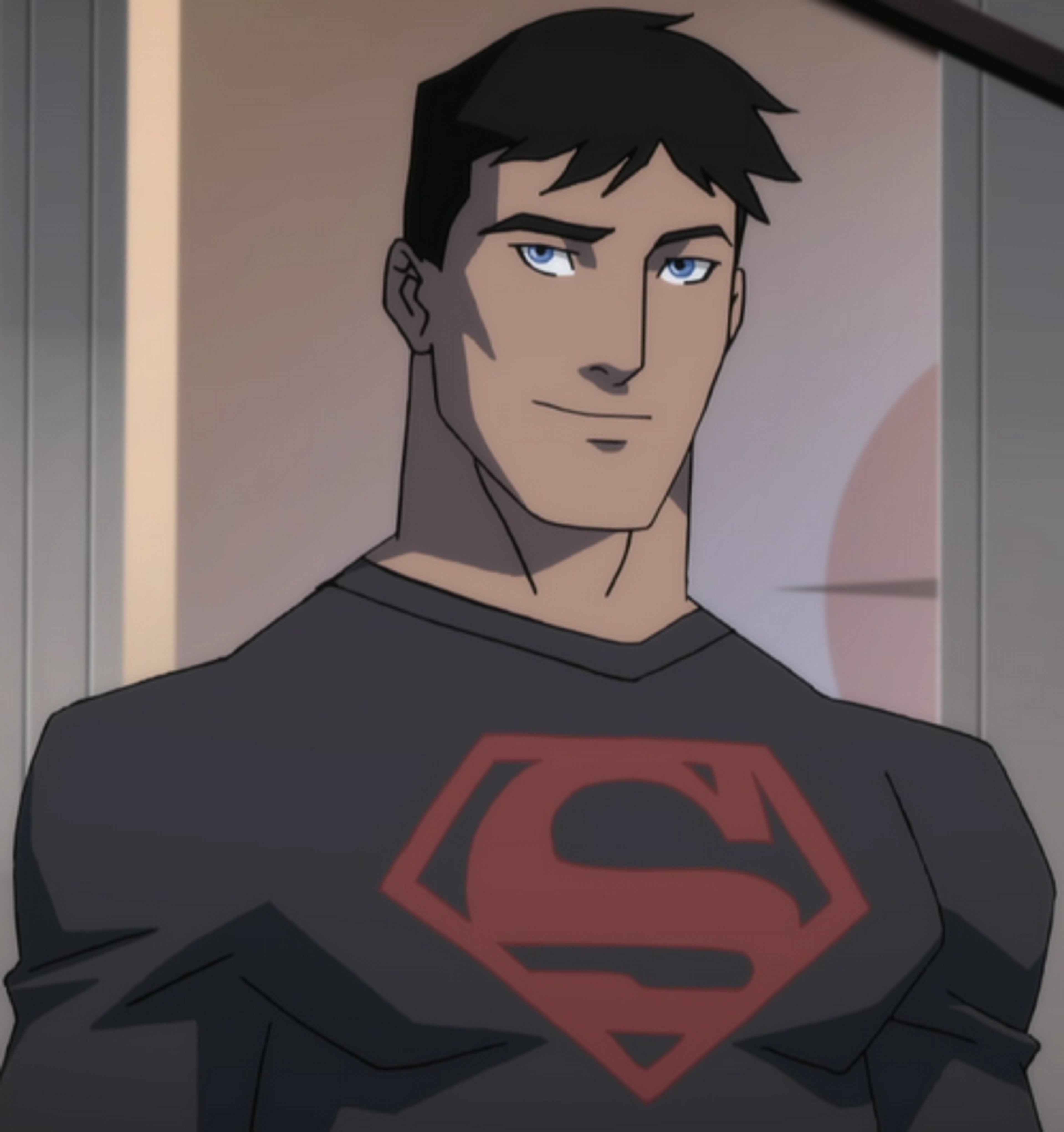 A young male superhero character with dark hair and a muscular build, wearing a black shirt with a red 'S' symbol.