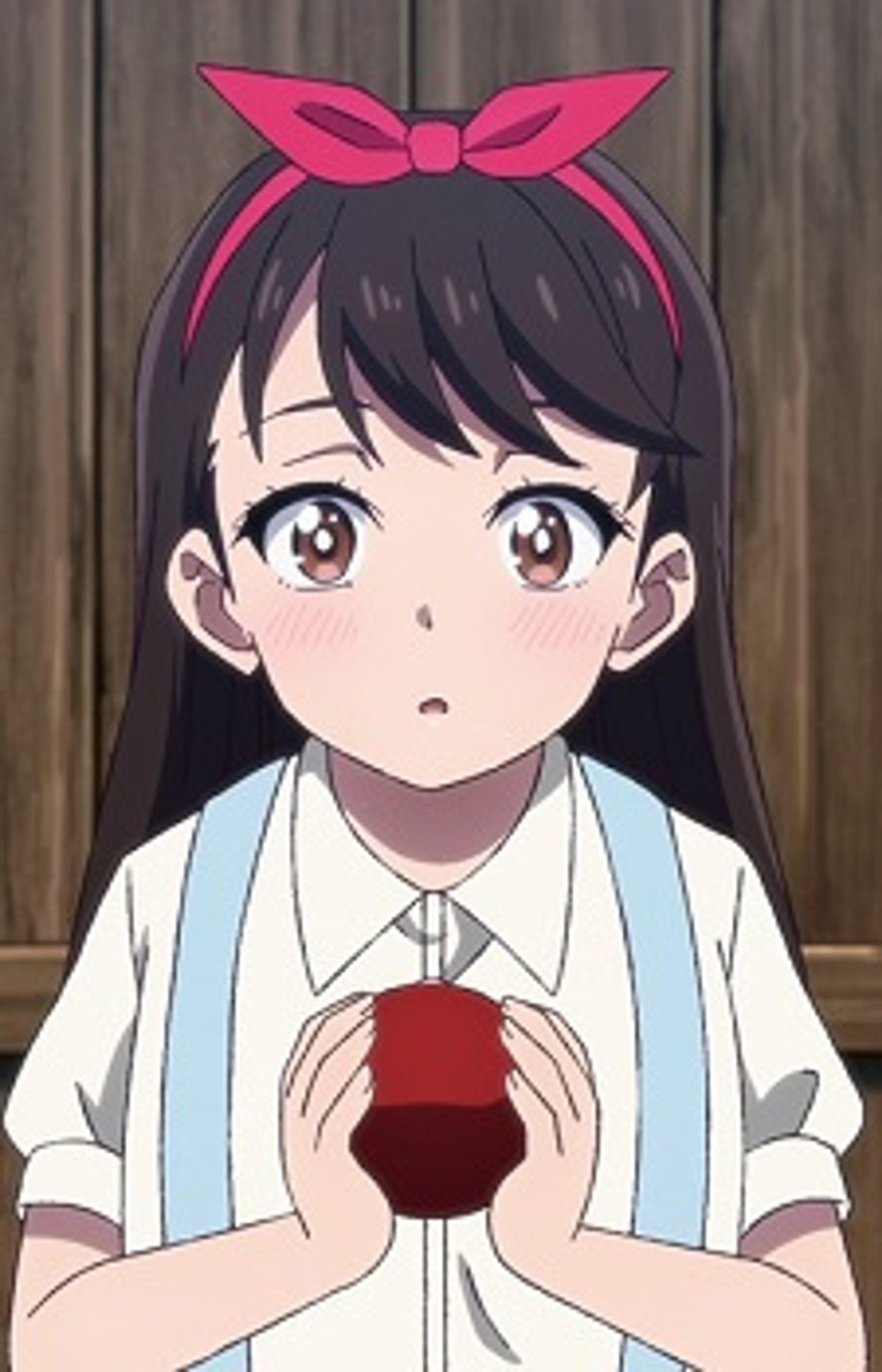 An anime-style illustration of a young girl with dark hair and a red bow