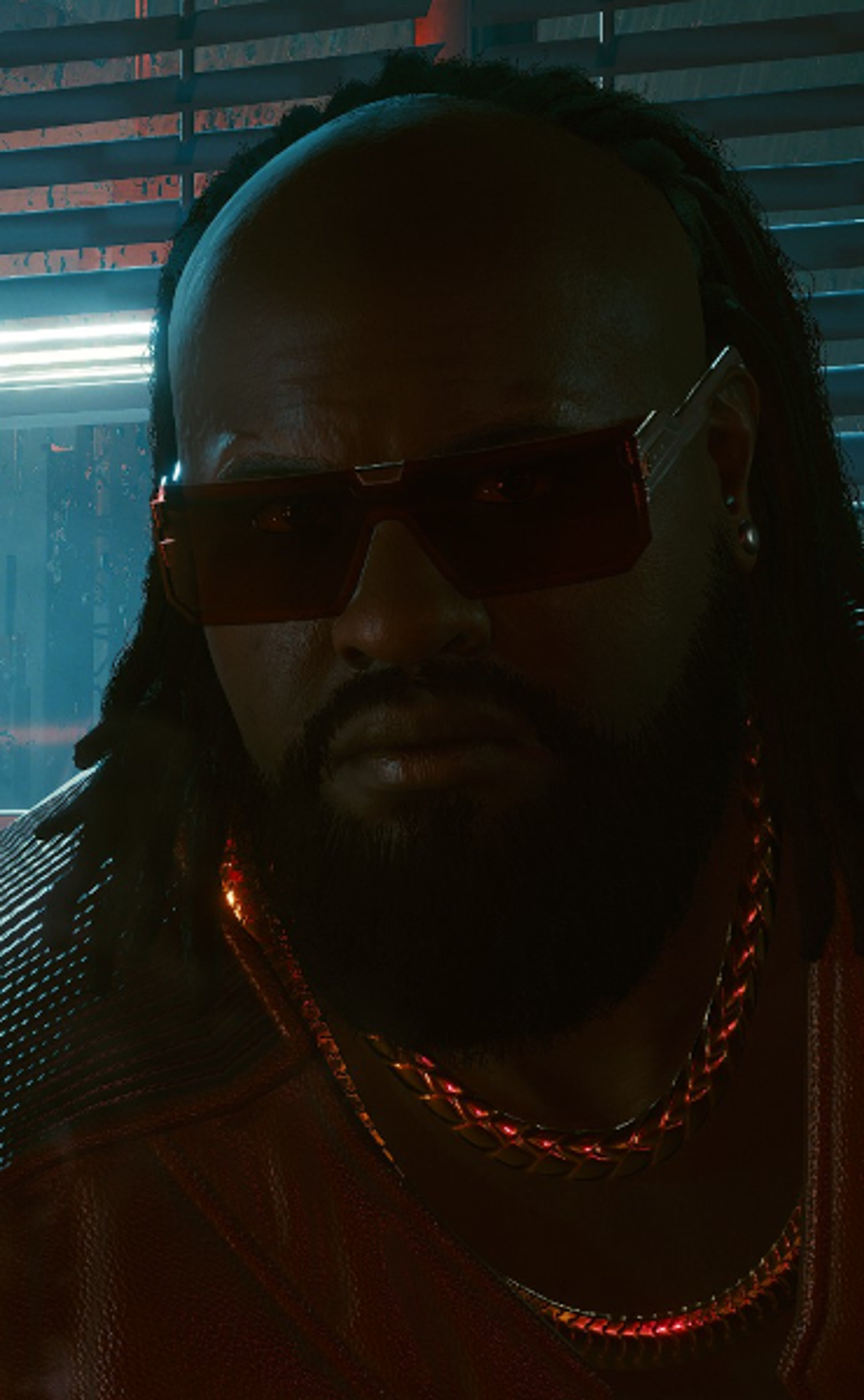 A well-dressed, imposing-looking man with a golden cybernetic arm