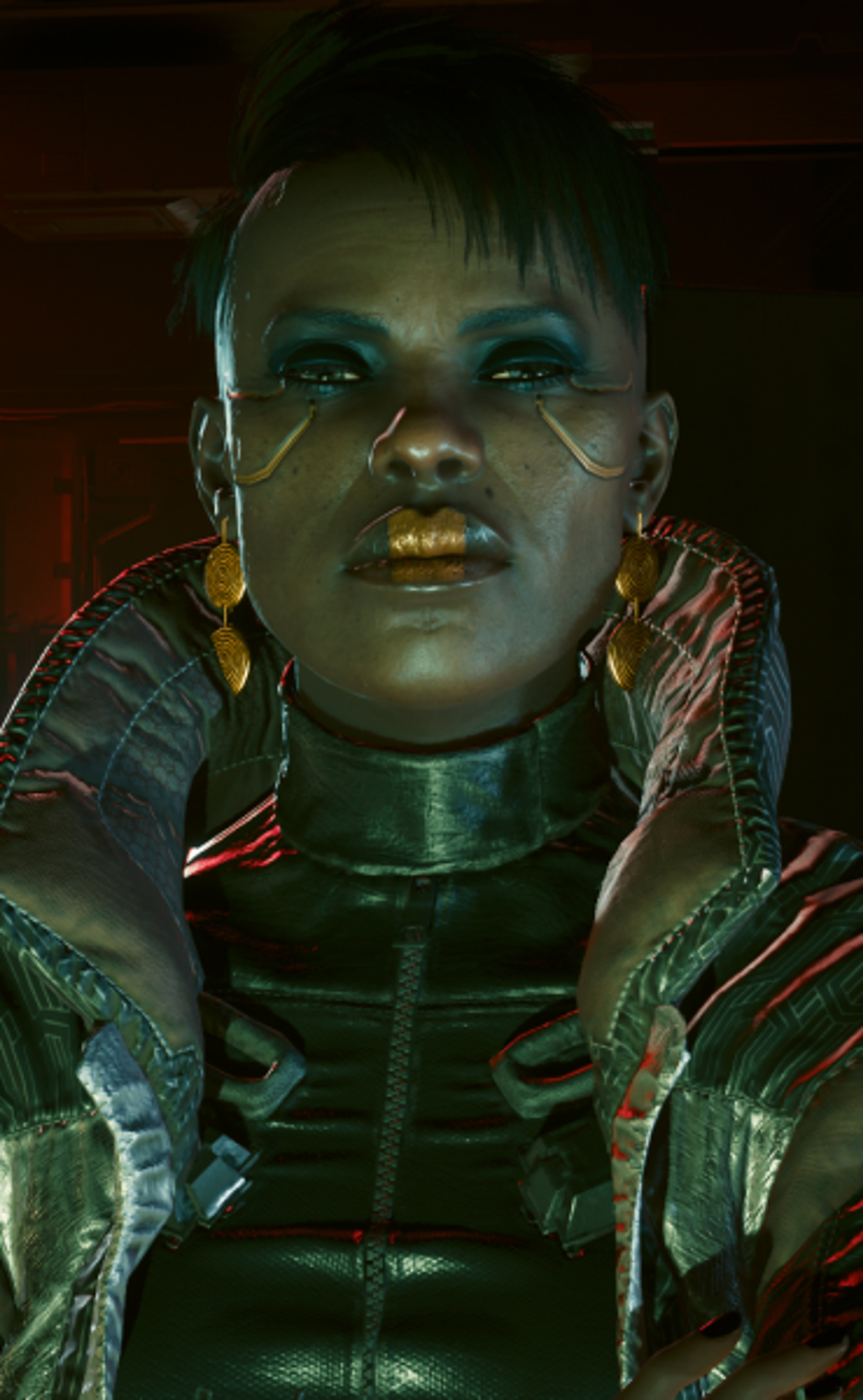 A close-up portrait of a woman with green skin, glowing eyes, and a cybernetic implant on her face.